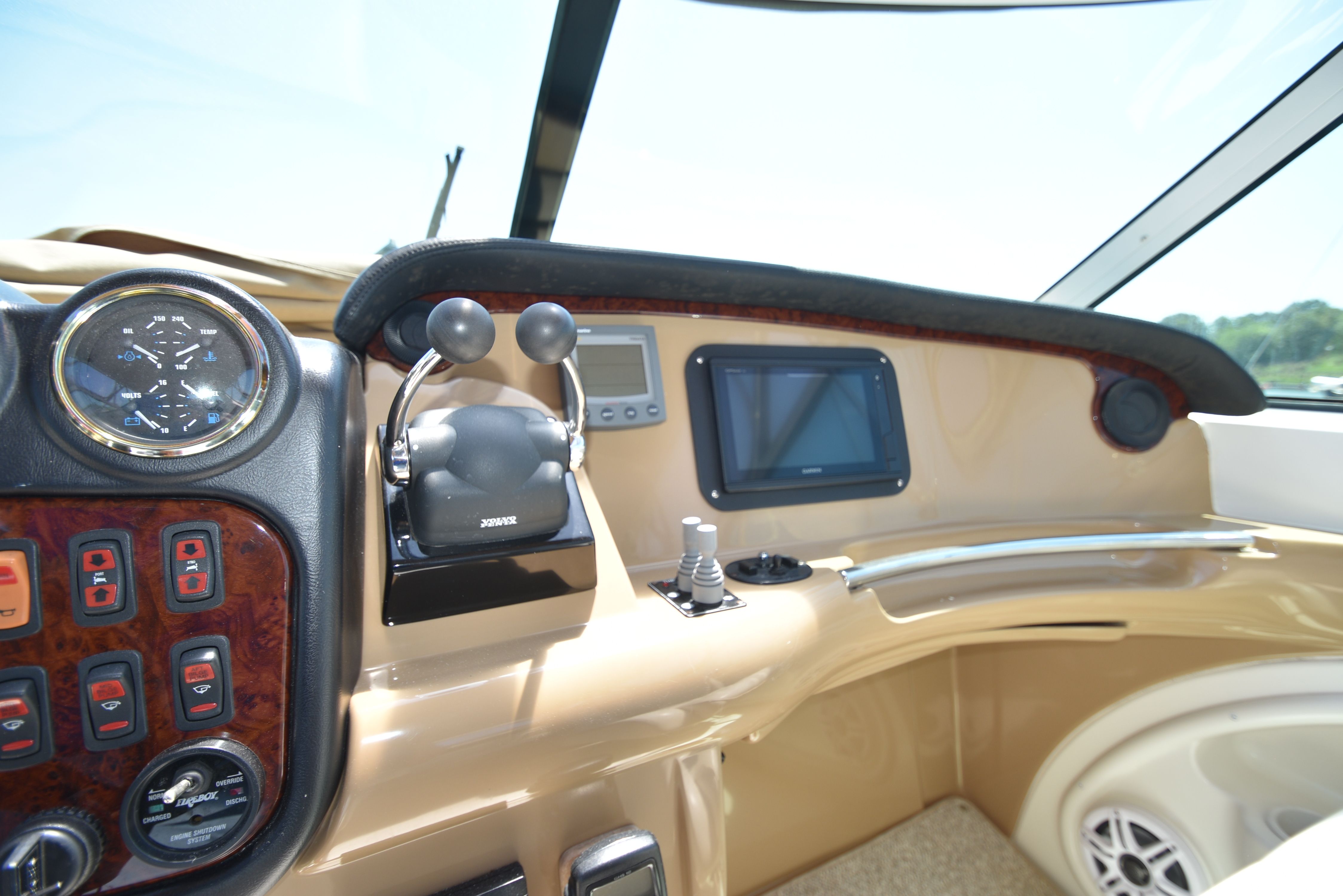 The cockpit of a 2004 Carver 466 Motor Yacht with controls and instruments.