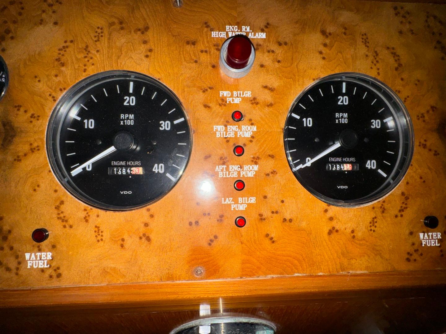 Control panel of a 2004 Ocean Alexander 42 yacht with RPM gauges and indicators.