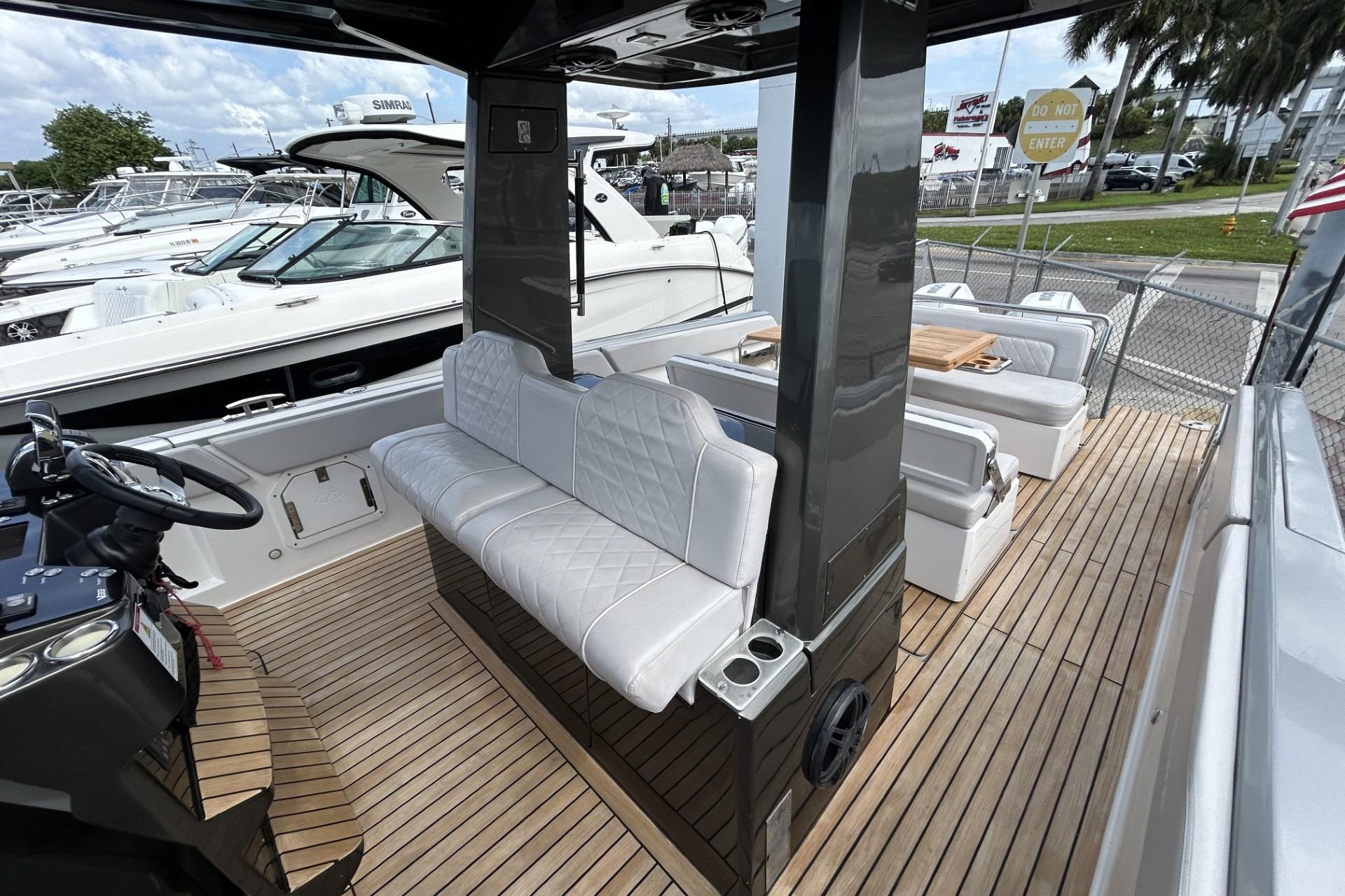 Luxurious 2023 Schaefer V33 yacht interior with elegant seating and modern design.