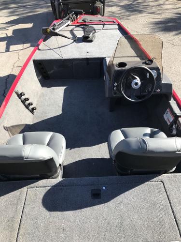 2025 Tracker Bass Tracker Classic XL boat interior with steering wheel and seating.