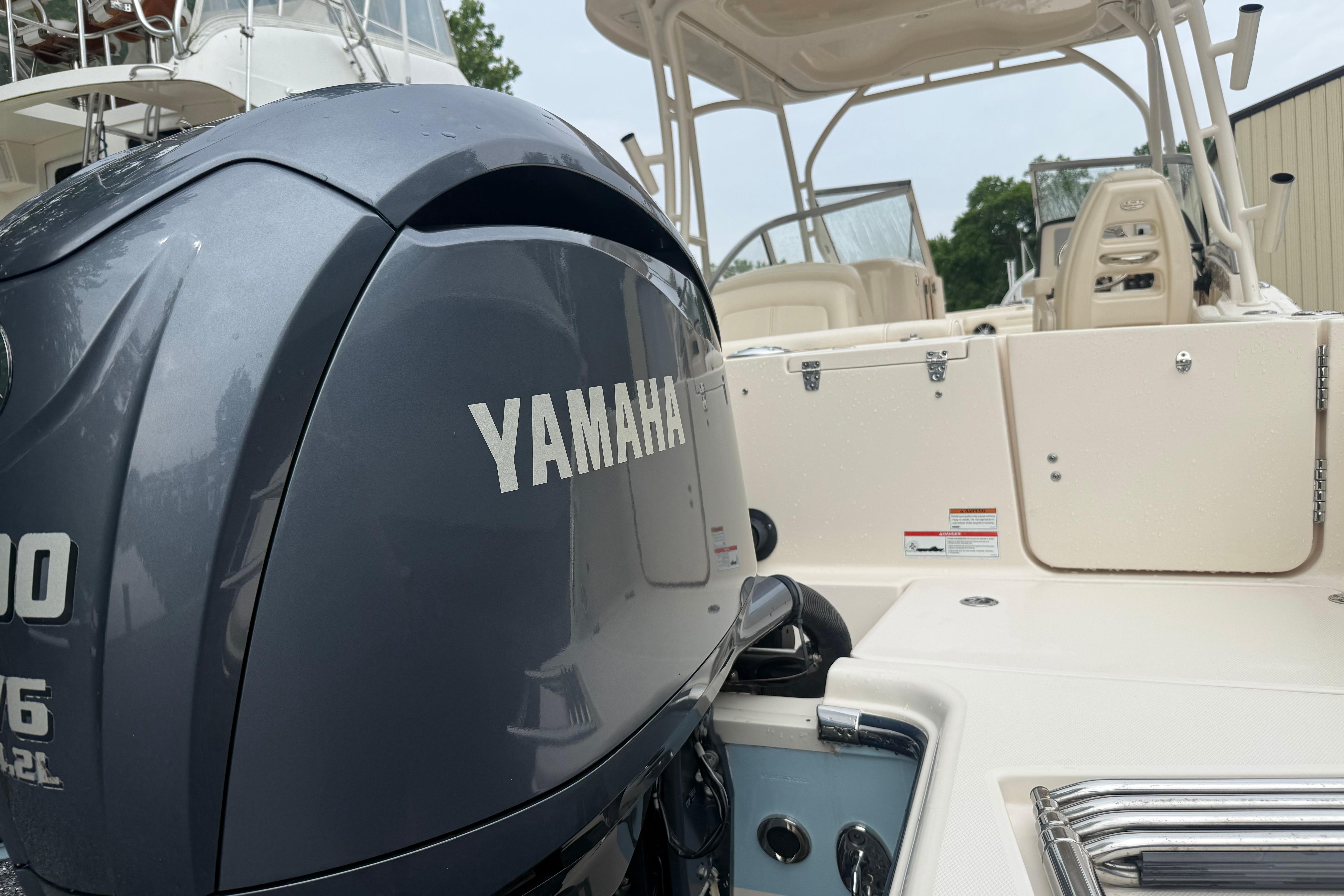 2022 Grady-White Freedom 235 boat with Yamaha outboard motor, showcasing sleek design.