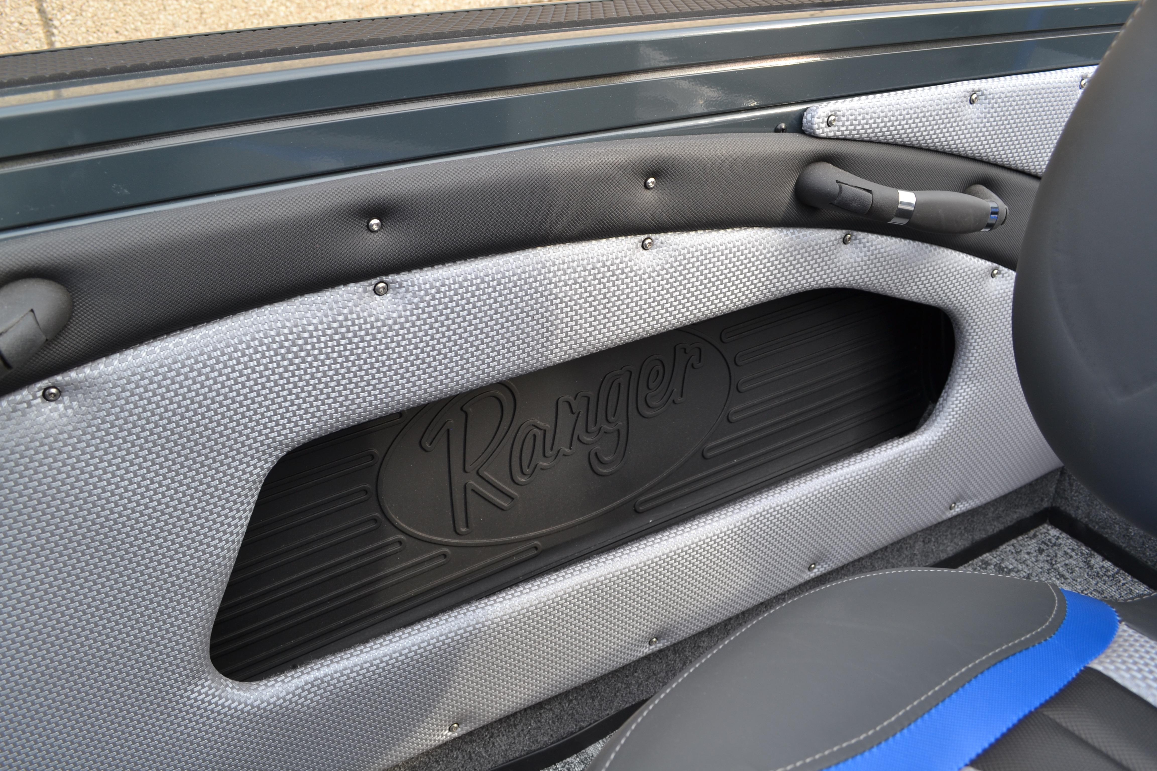 Interior detail of 2026 Ranger VX1888 WT boat, featuring textured paneling and logo.