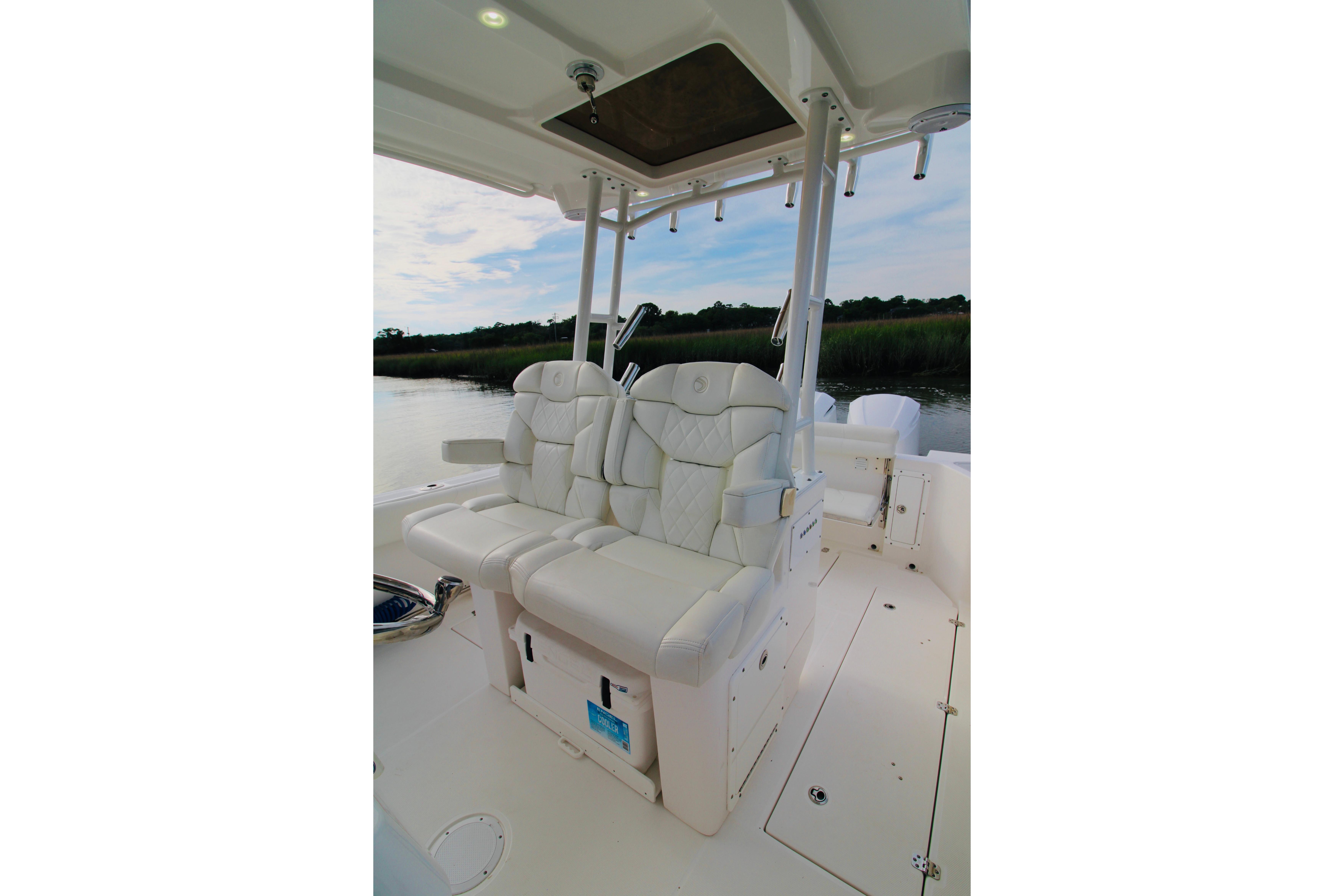 2022 Edgewater 280CC boat interior with luxurious white seating.