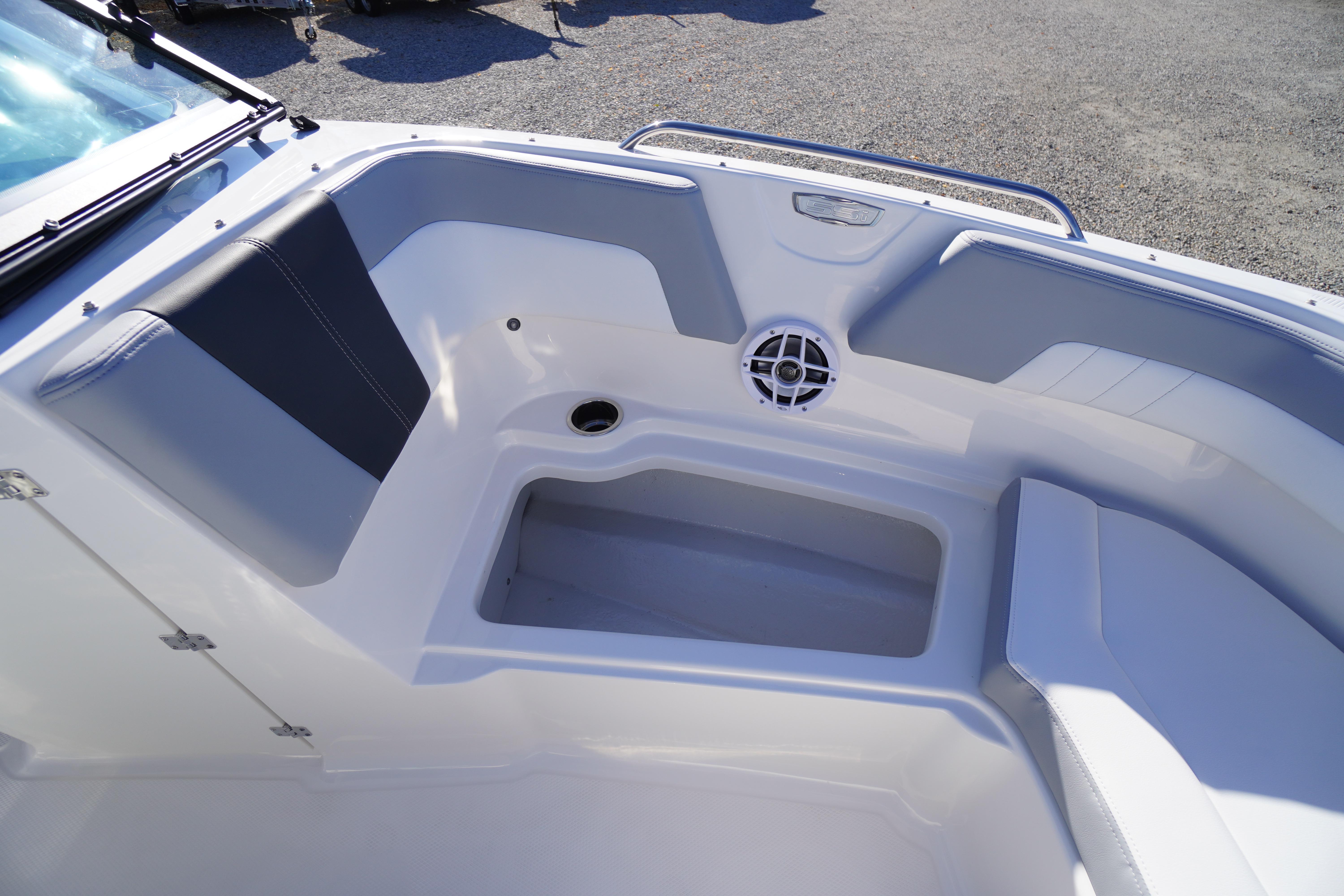 Interior view of 2026 Chaparral 23 SSi boat, featuring seating and speaker.