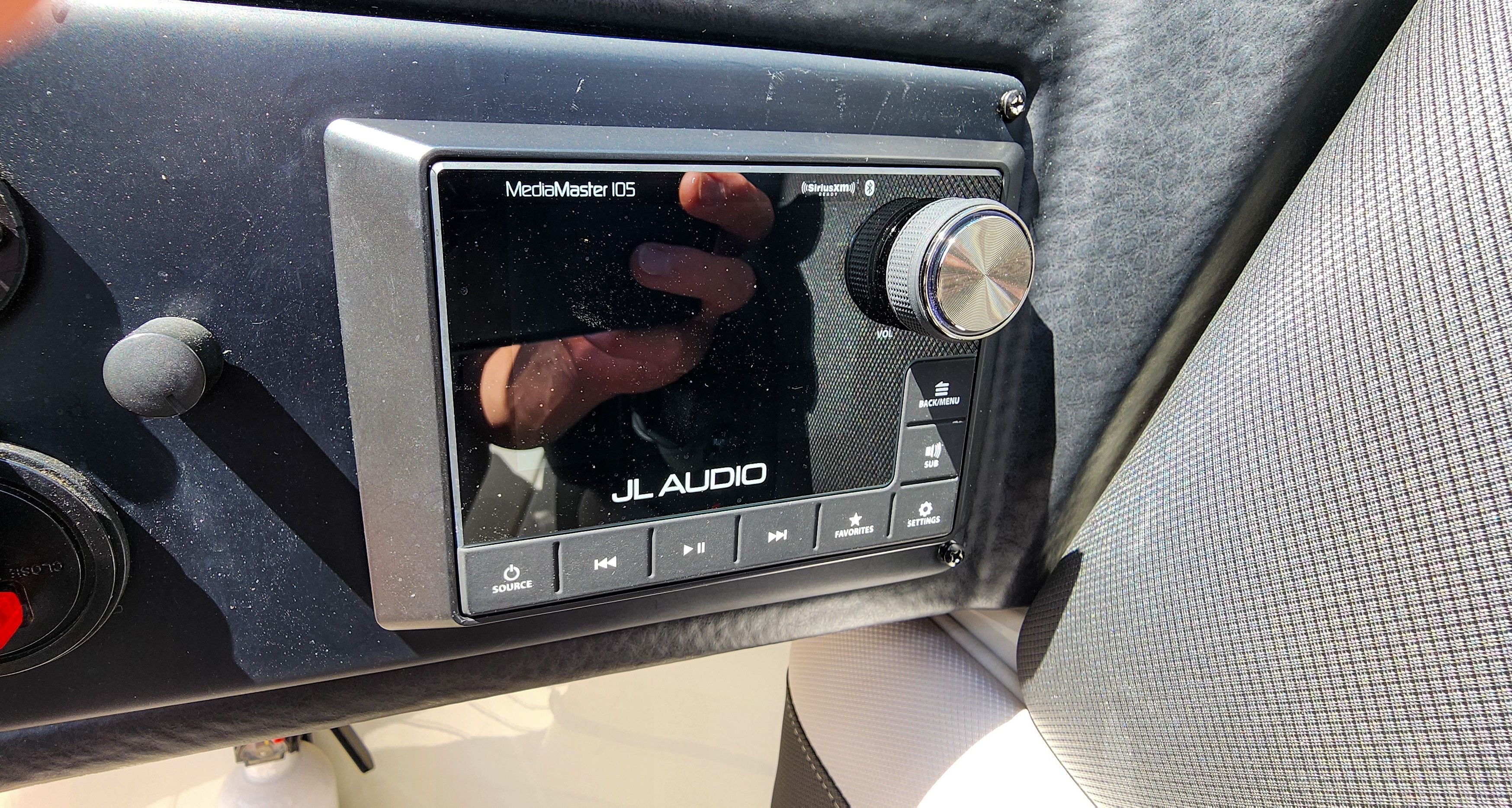 Close-up of a JL Audio MediaMaster 105 control unit on a Crownline 285SS boat.