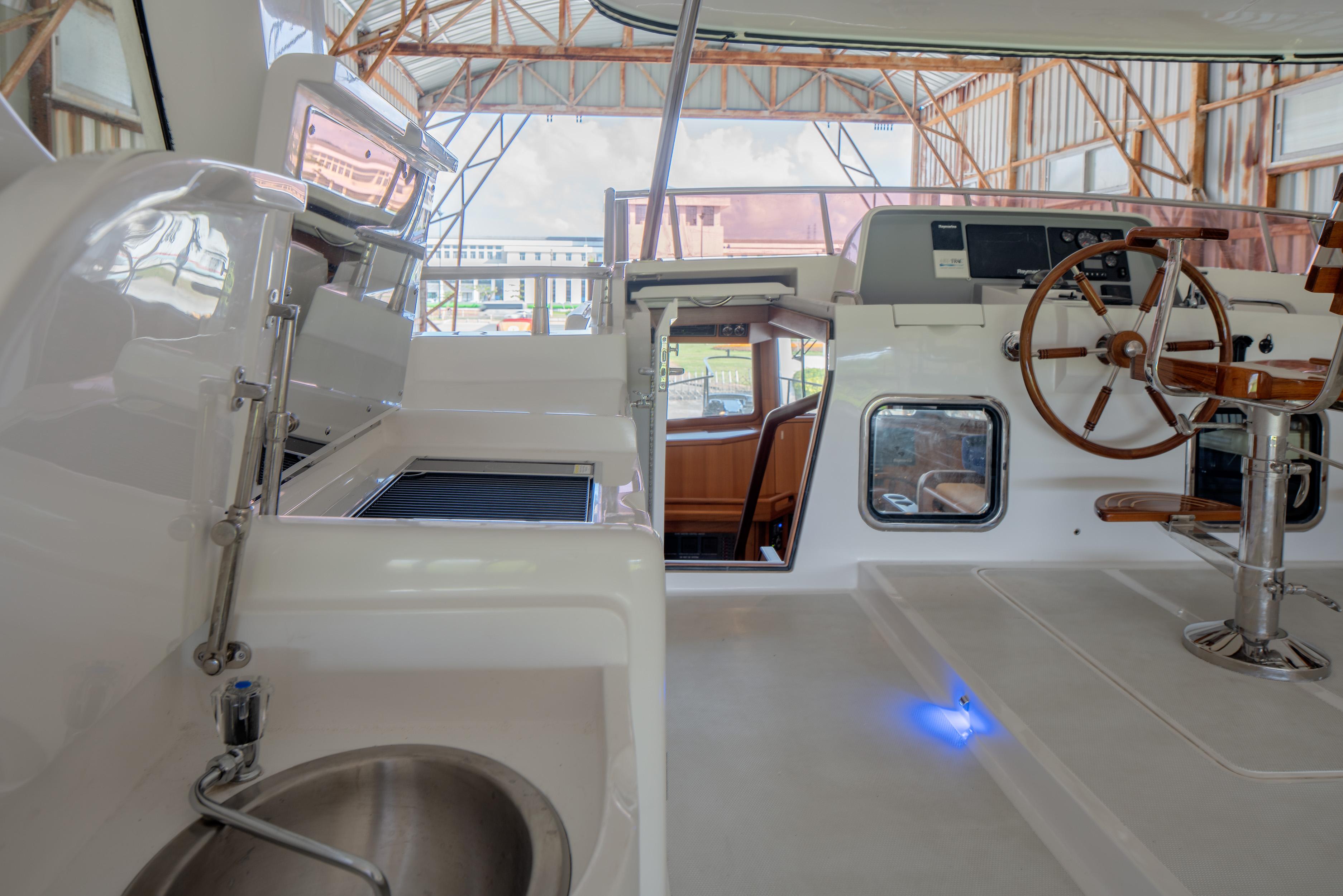 Interior view of 2026 Selene 49 Classic Explorer yacht with helm and seating area.