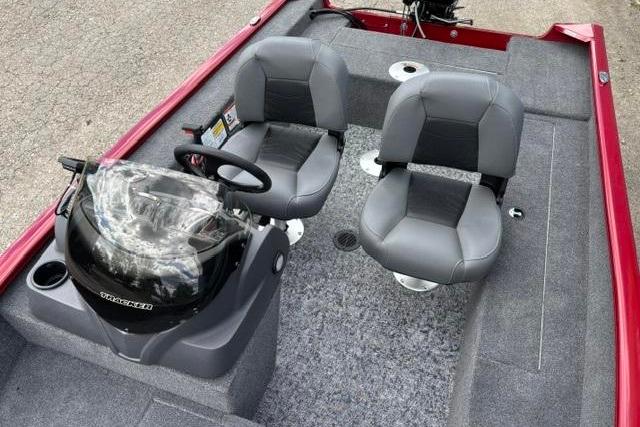 2025 Tracker Super Guide V-16 SC boat interior with dual gray seats and steering console.