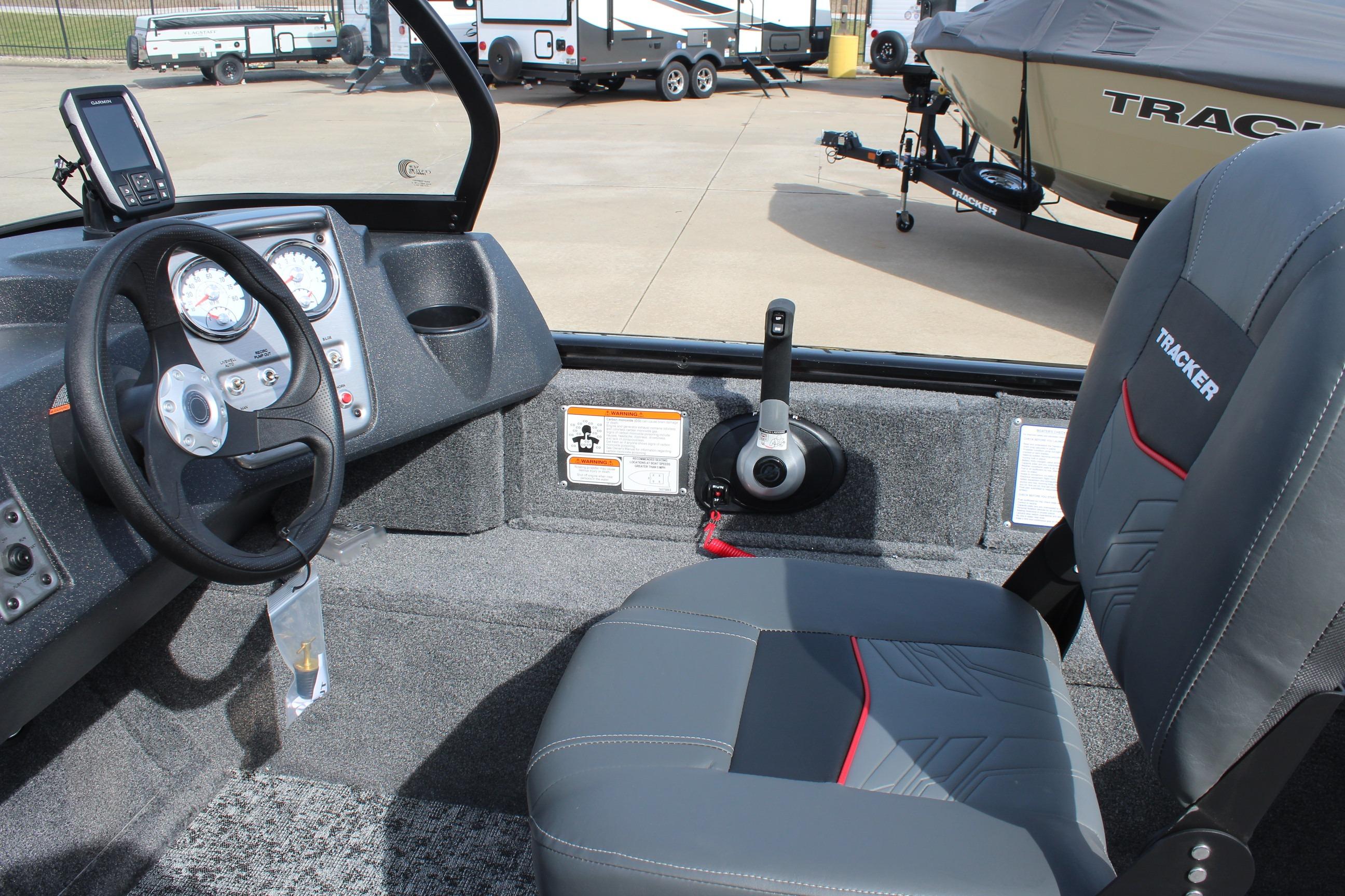 2026 Tracker Targa V-18 Combo boat interior with steering wheel and control panel.