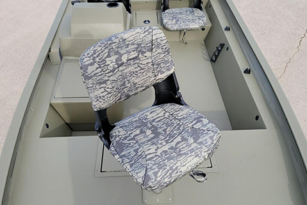 2026 Tracker Grizzly 1754 SC boat interior with camouflage-patterned seats.