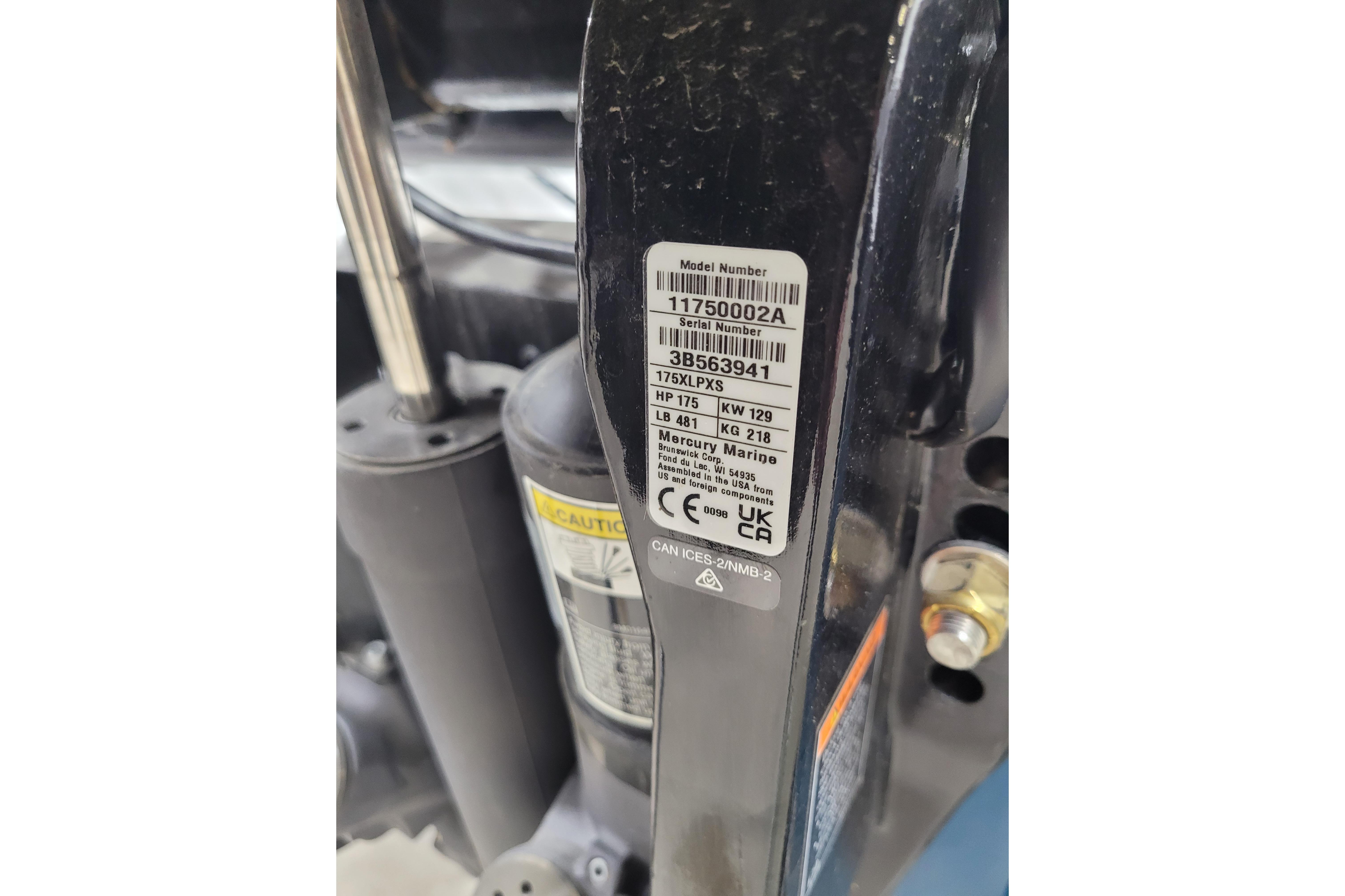 Label on a 2026 Tahoe 2150 boat engine, displaying model and serial numbers.