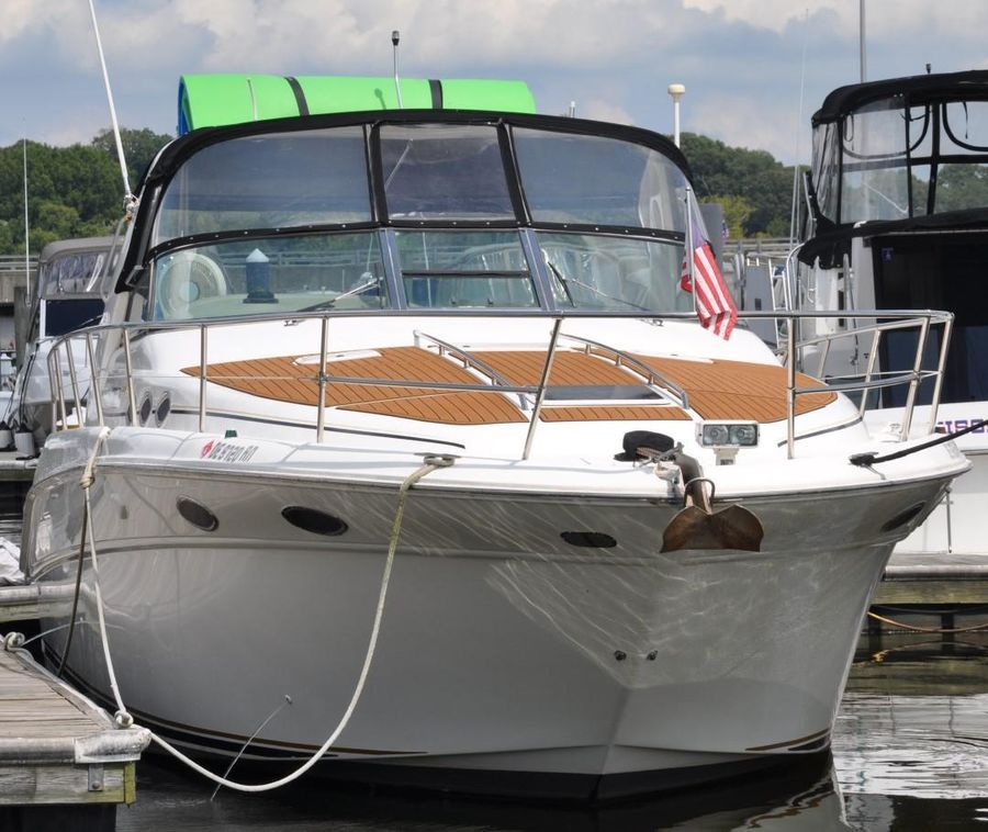 1998 Sea Ray Sundancer 370 docked at marina.