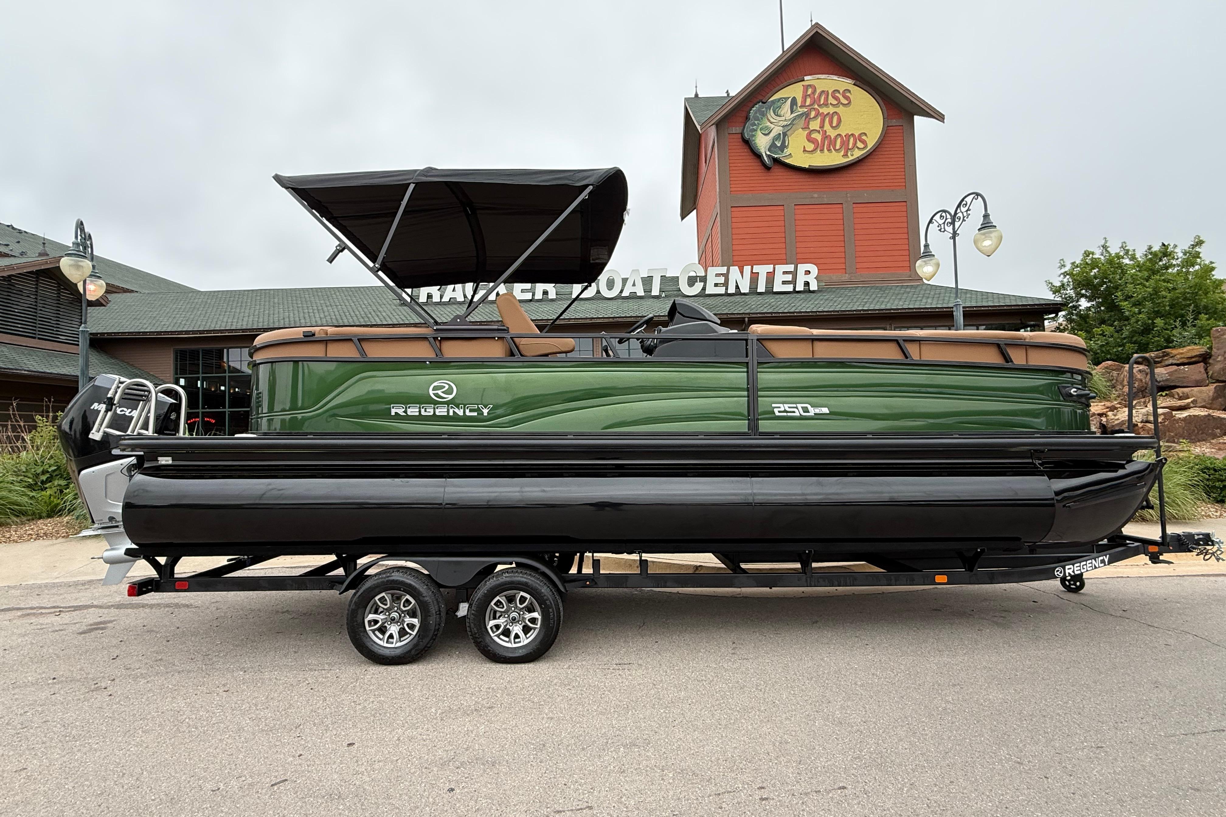 2026 Regency 250 DL pontoon boat at Bass Pro Shops, featuring sleek design and modern amenities.