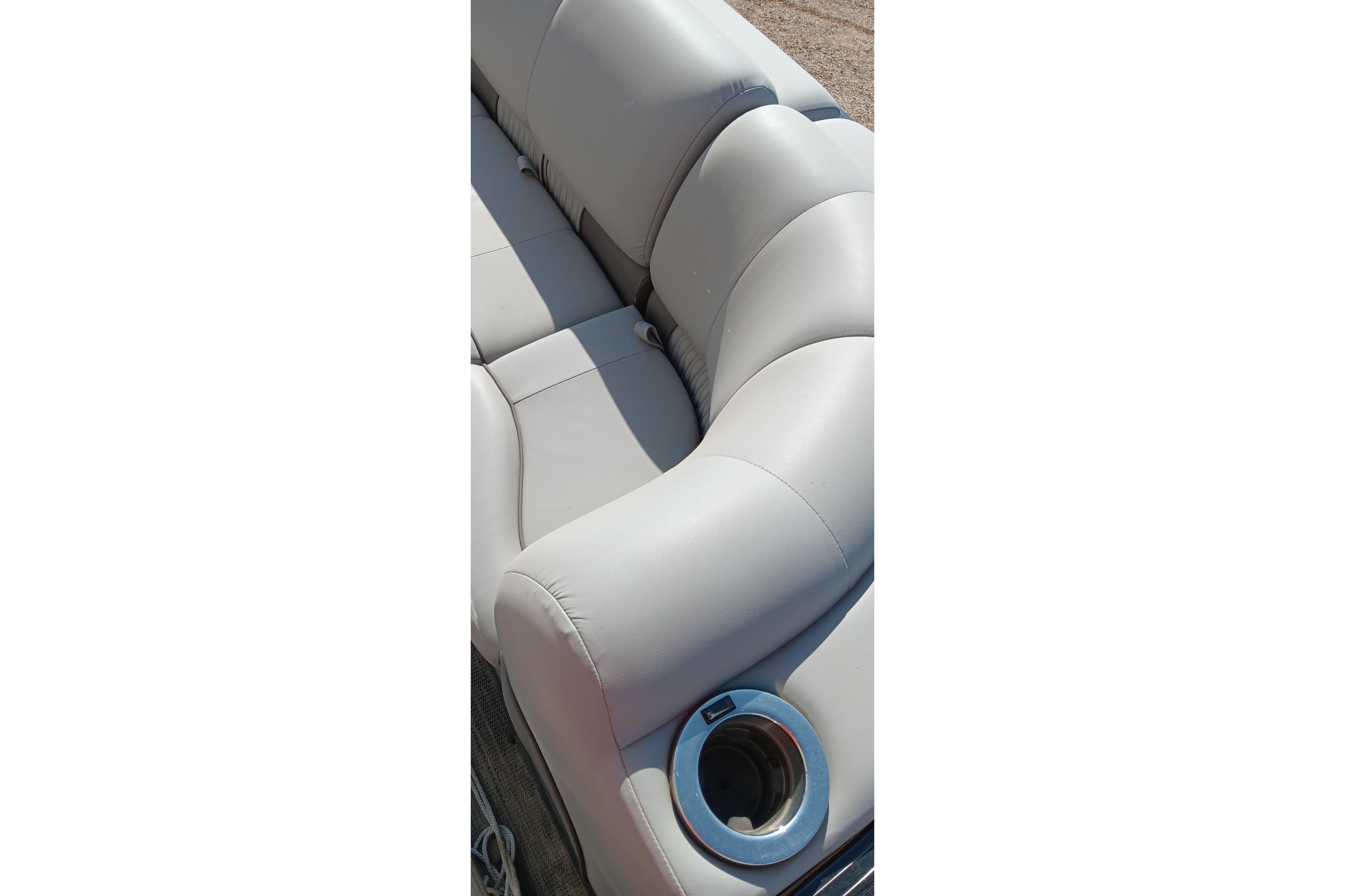 2023 Ranger 2500LS boat seat with cup holder, featuring light gray upholstery.