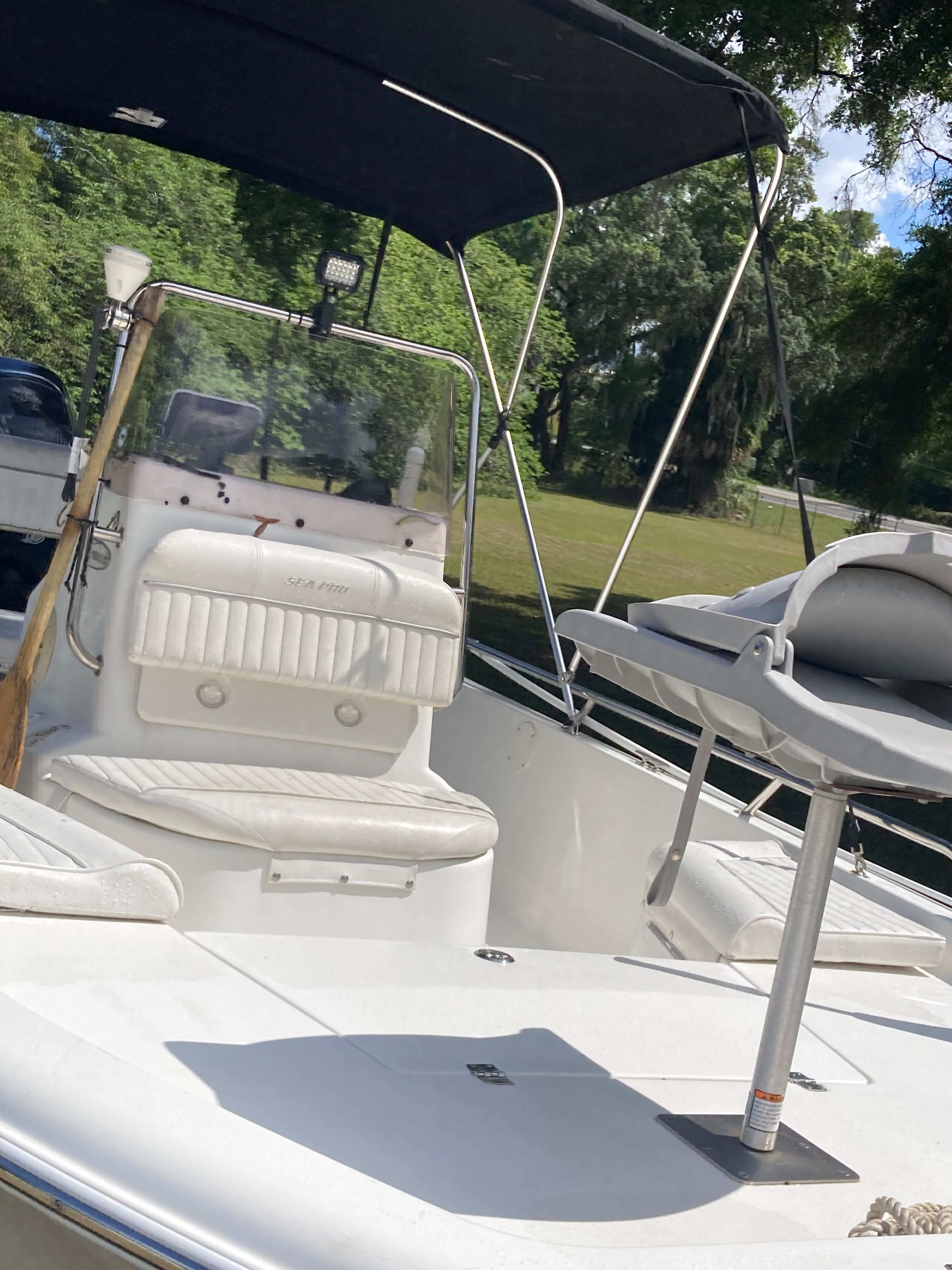 2007 Seapro SV1900CC boat with seating area and canopy.