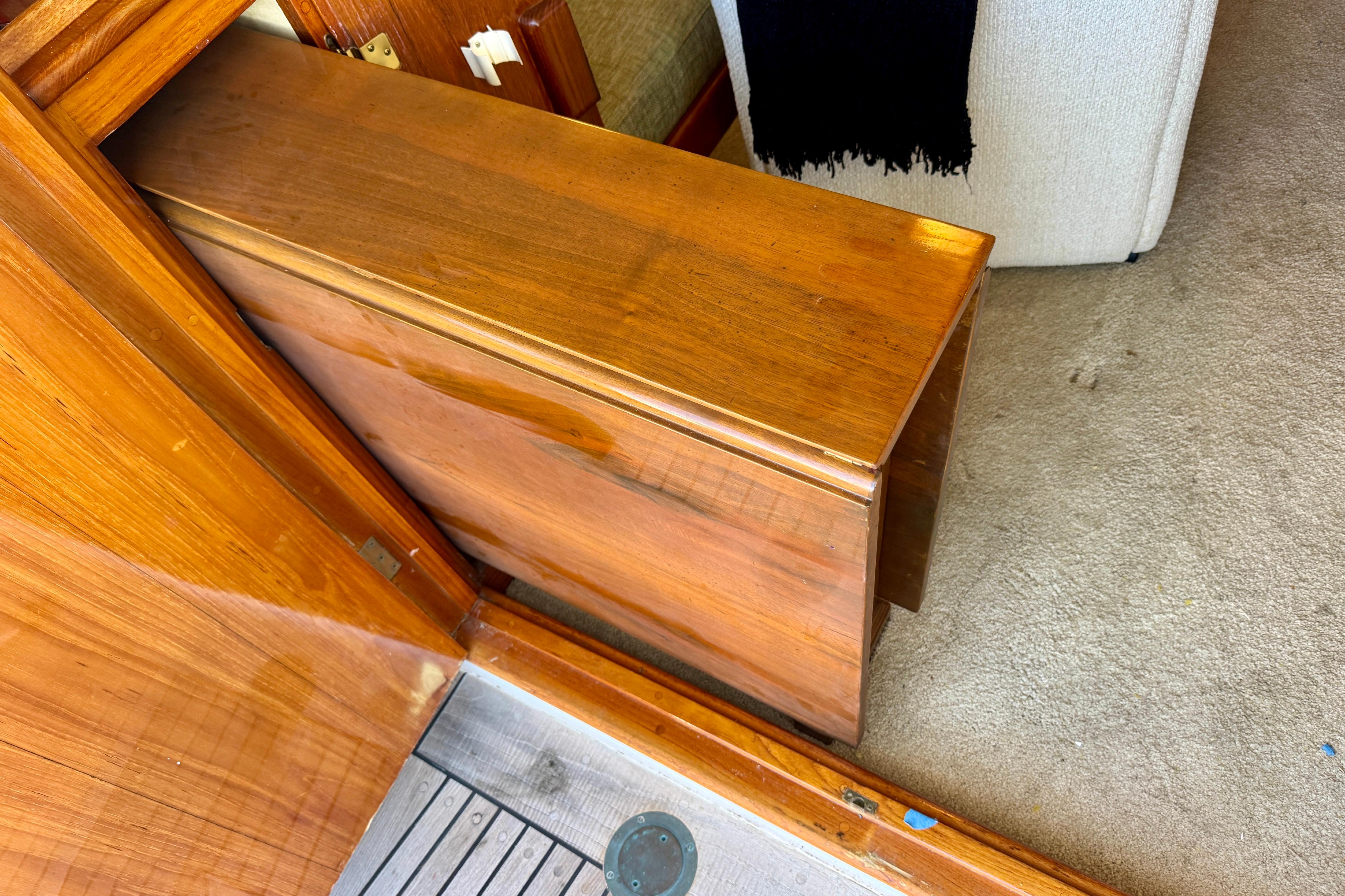 Wooden interior detail of a 1958 Blanchard Pilothouse, showcasing craftsmanship and design.