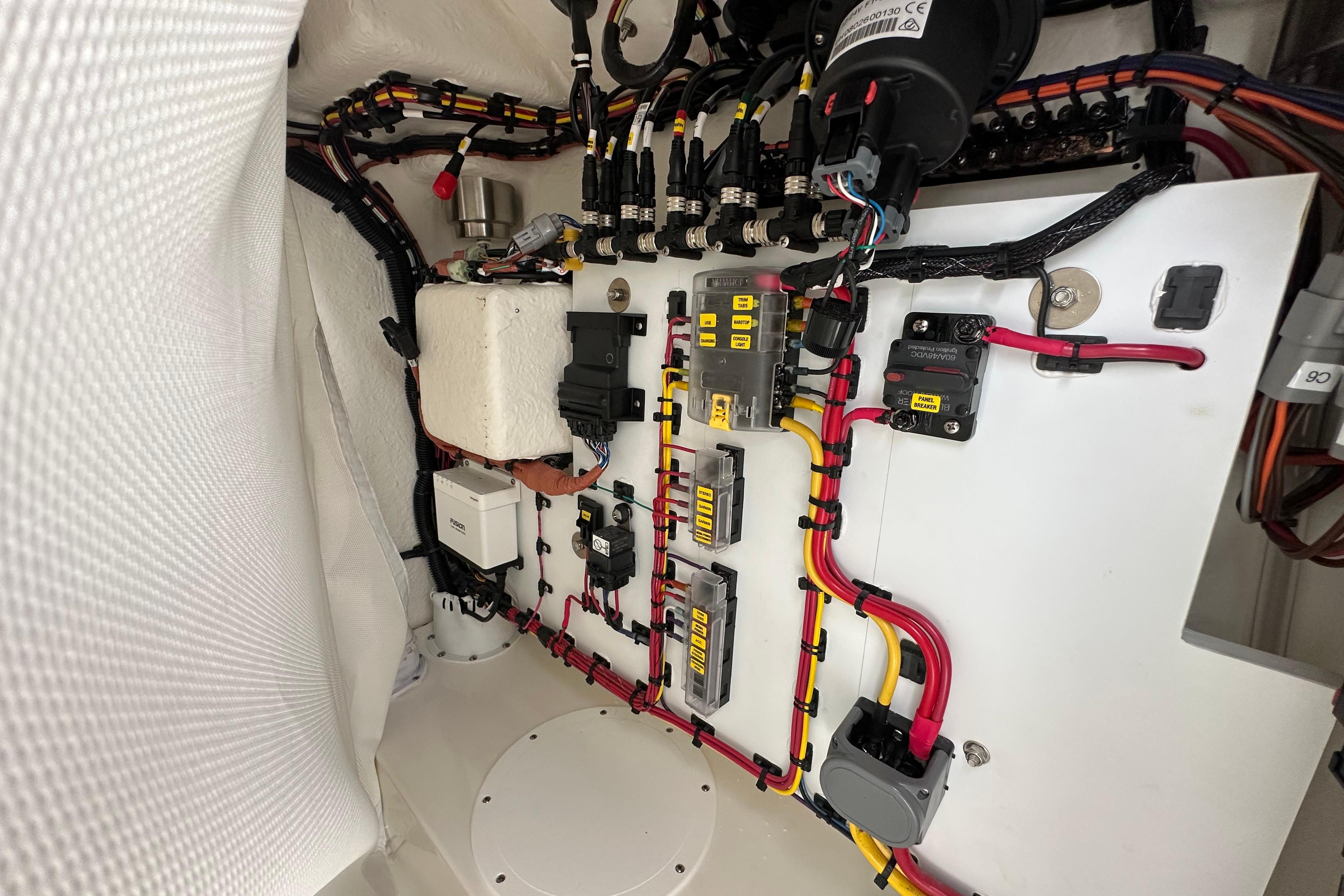 Electrical wiring system inside a 2027 Sea Born LX24 Center Console boat.