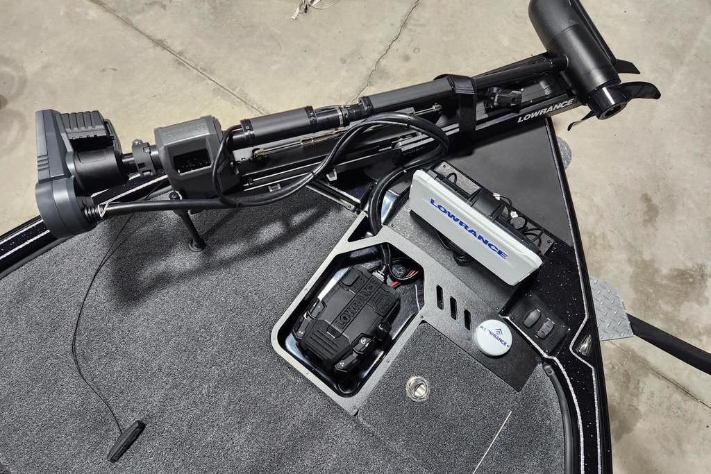 2026 Triton 20XP Patriot boat with advanced Lowrance electronics and trolling motor.