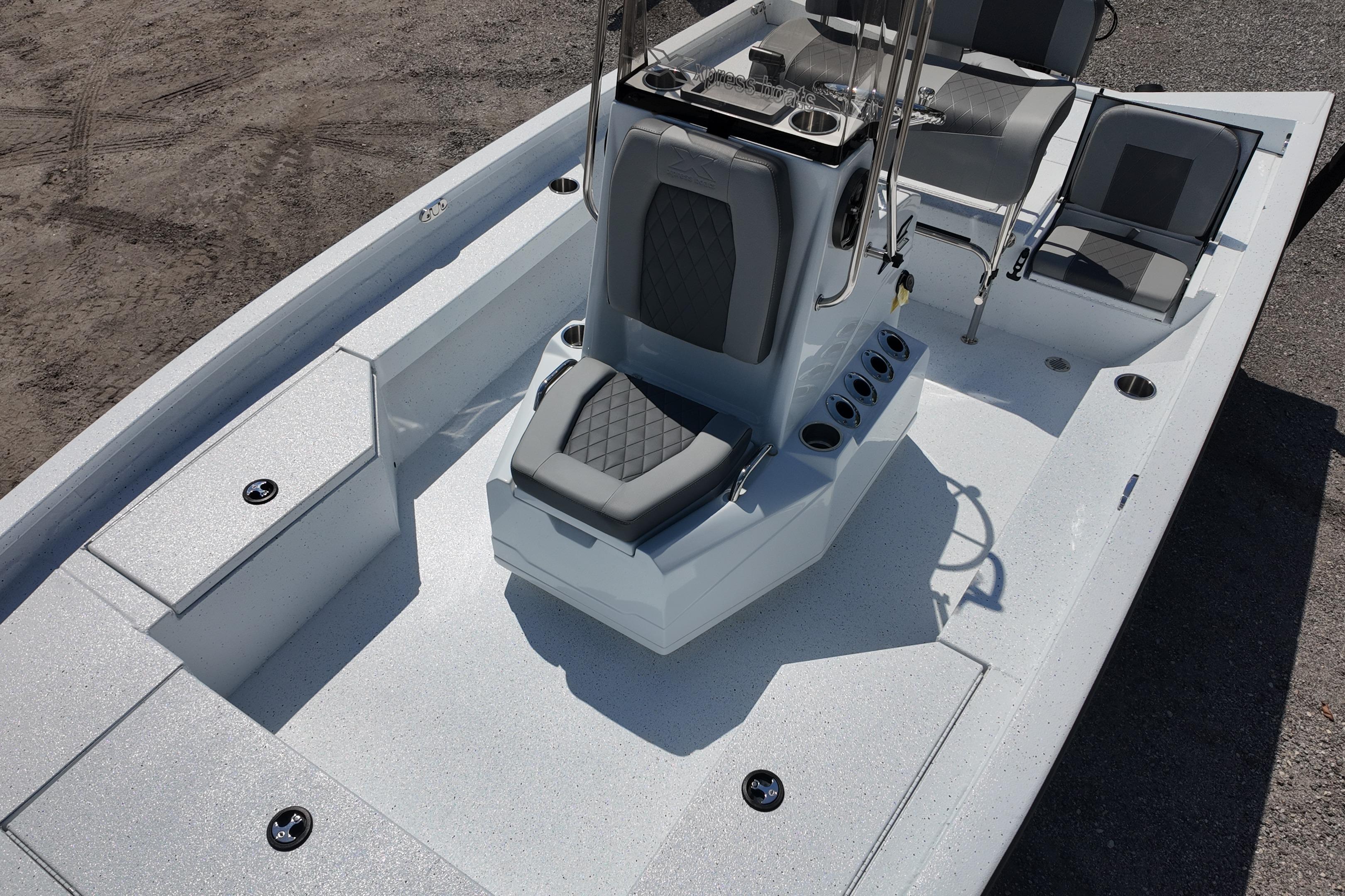 2026 Xpress H20 boat interior with seating and console, featuring modern design and functionality.