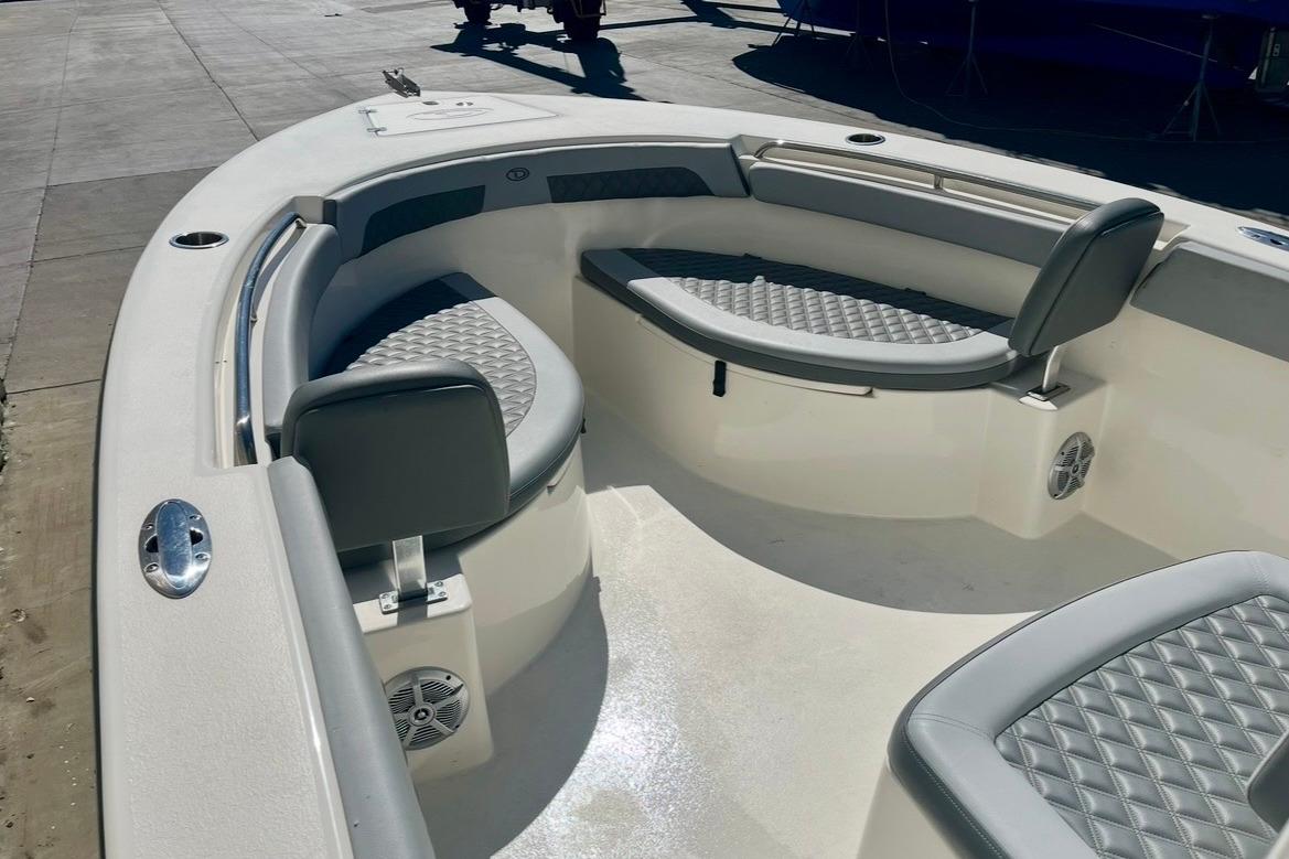 2025 Defiance Catalina 240 boat interior with cushioned seating and modern design.