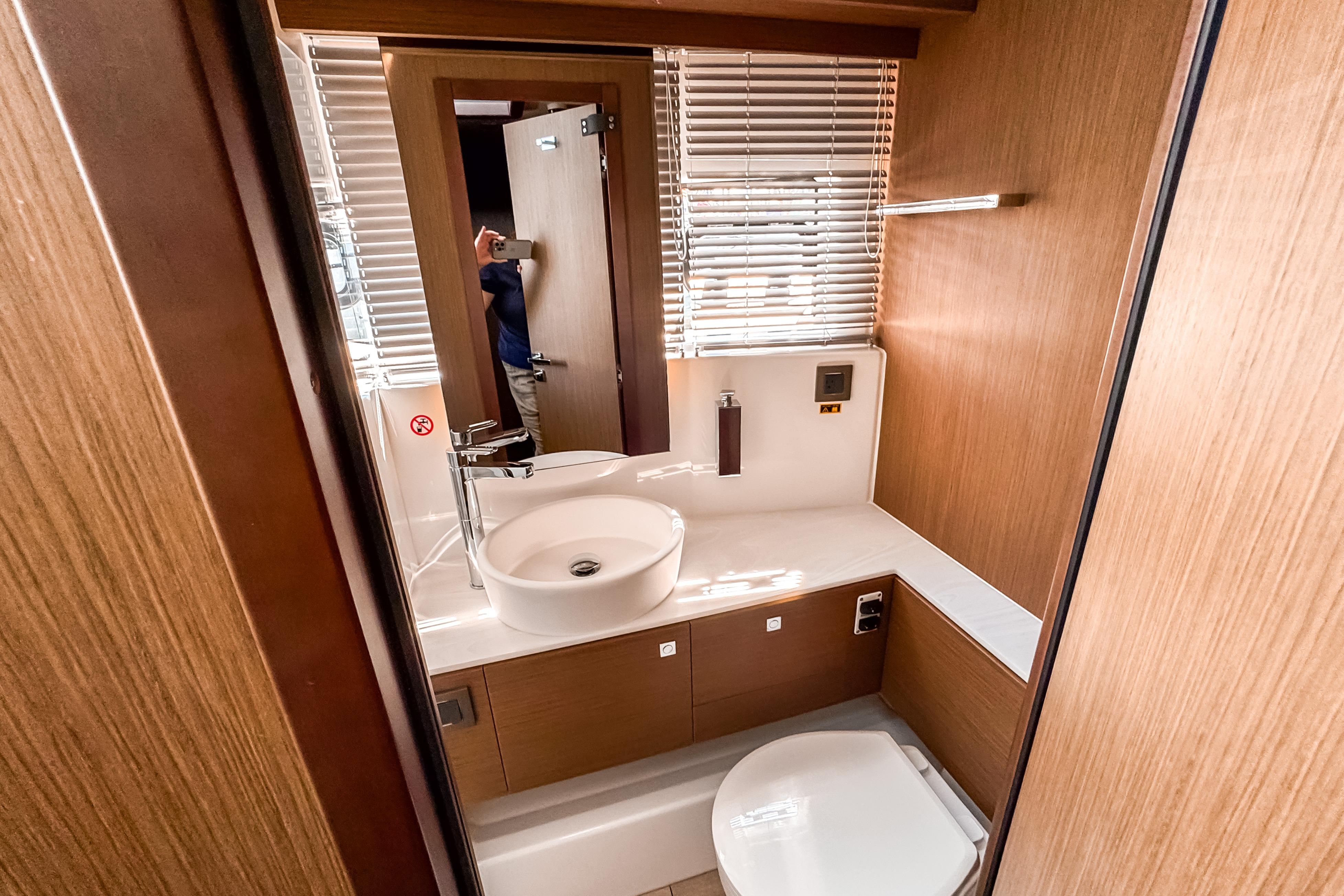 Modern bathroom in Wellcraft 44 Explorer 2026 yacht.