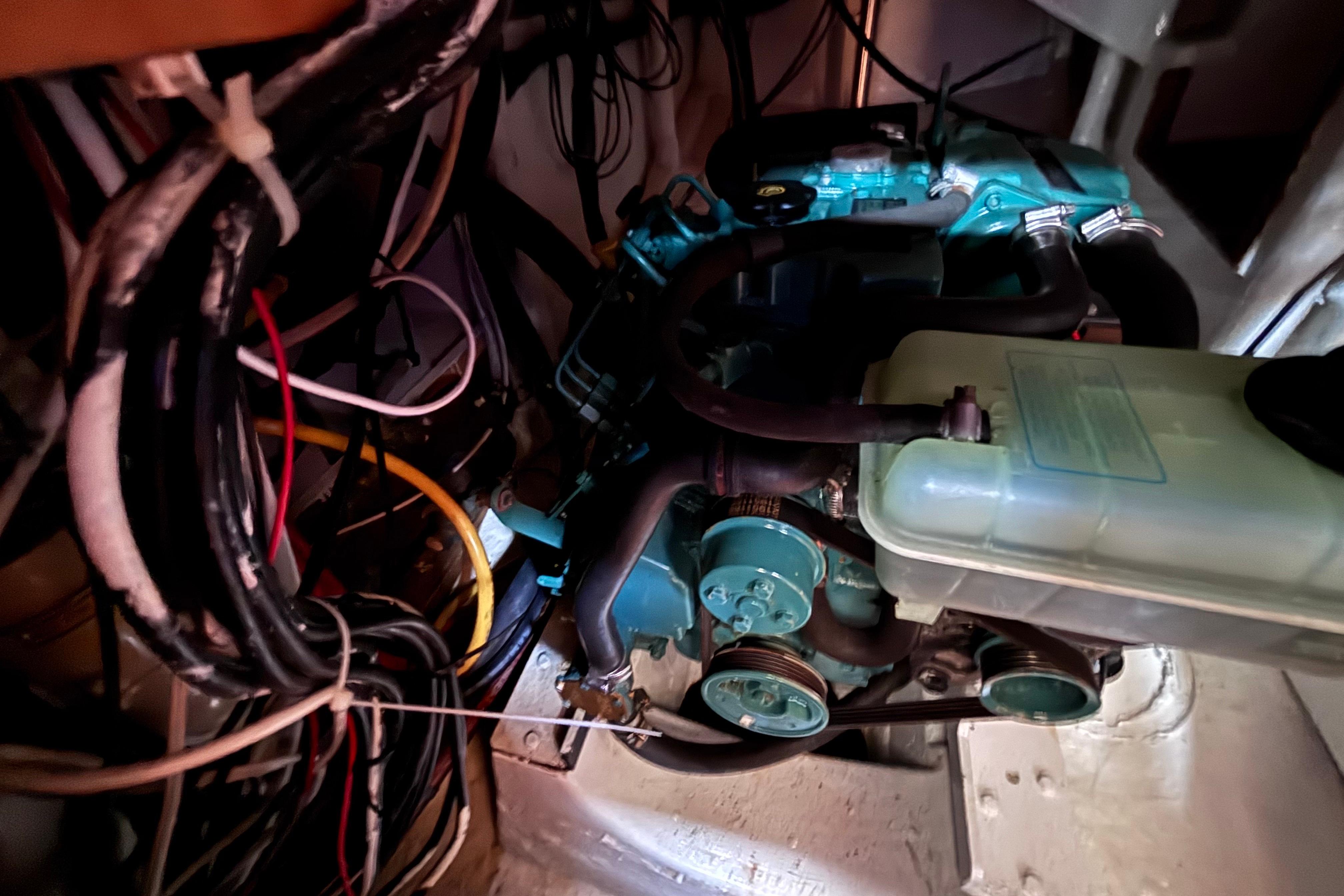 Engine compartment of a 1978 Swift 33, showcasing wiring and mechanical components.