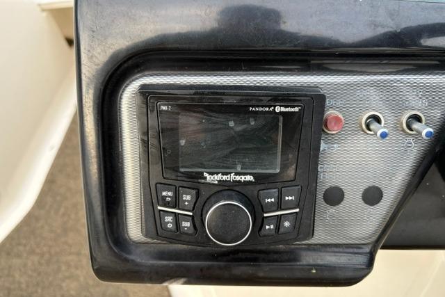 Rockford Fosgate audio system on 2017 Searay SPX210 boat dashboard with Bluetooth connectivity.
