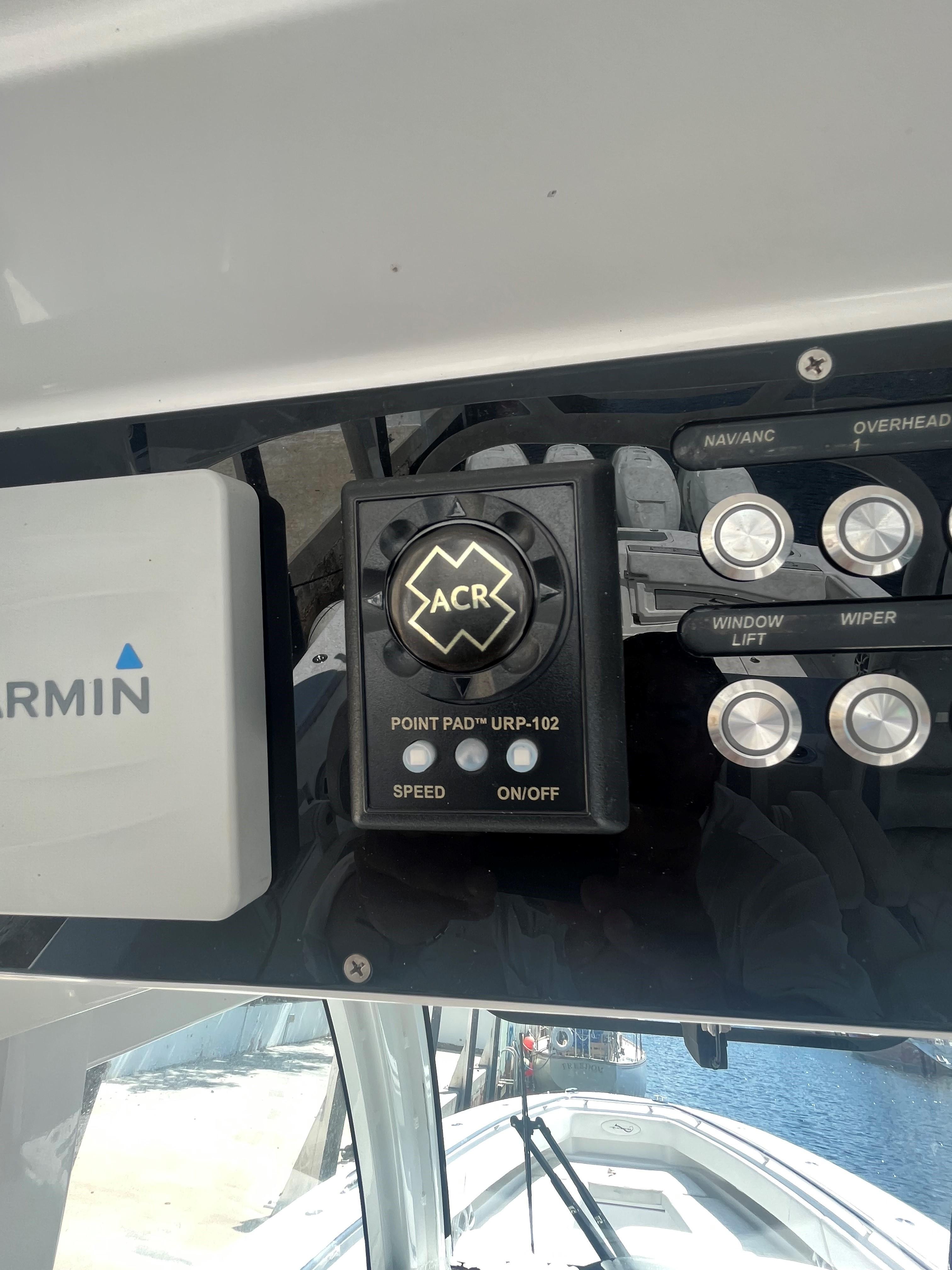 Control panel of a 2018 Blackwater 43 boat with Garmin and ACR systems.
