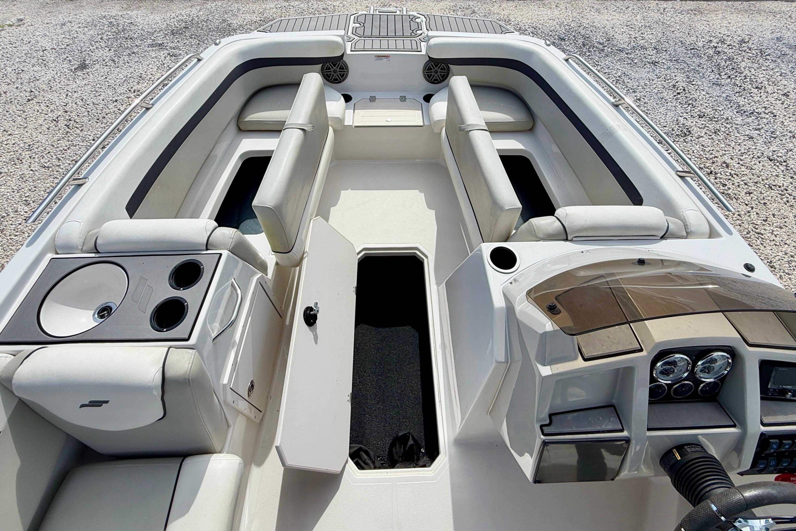 2021 Starcraft SVX 191 OB boat interior with seating, console, and storage compartments.