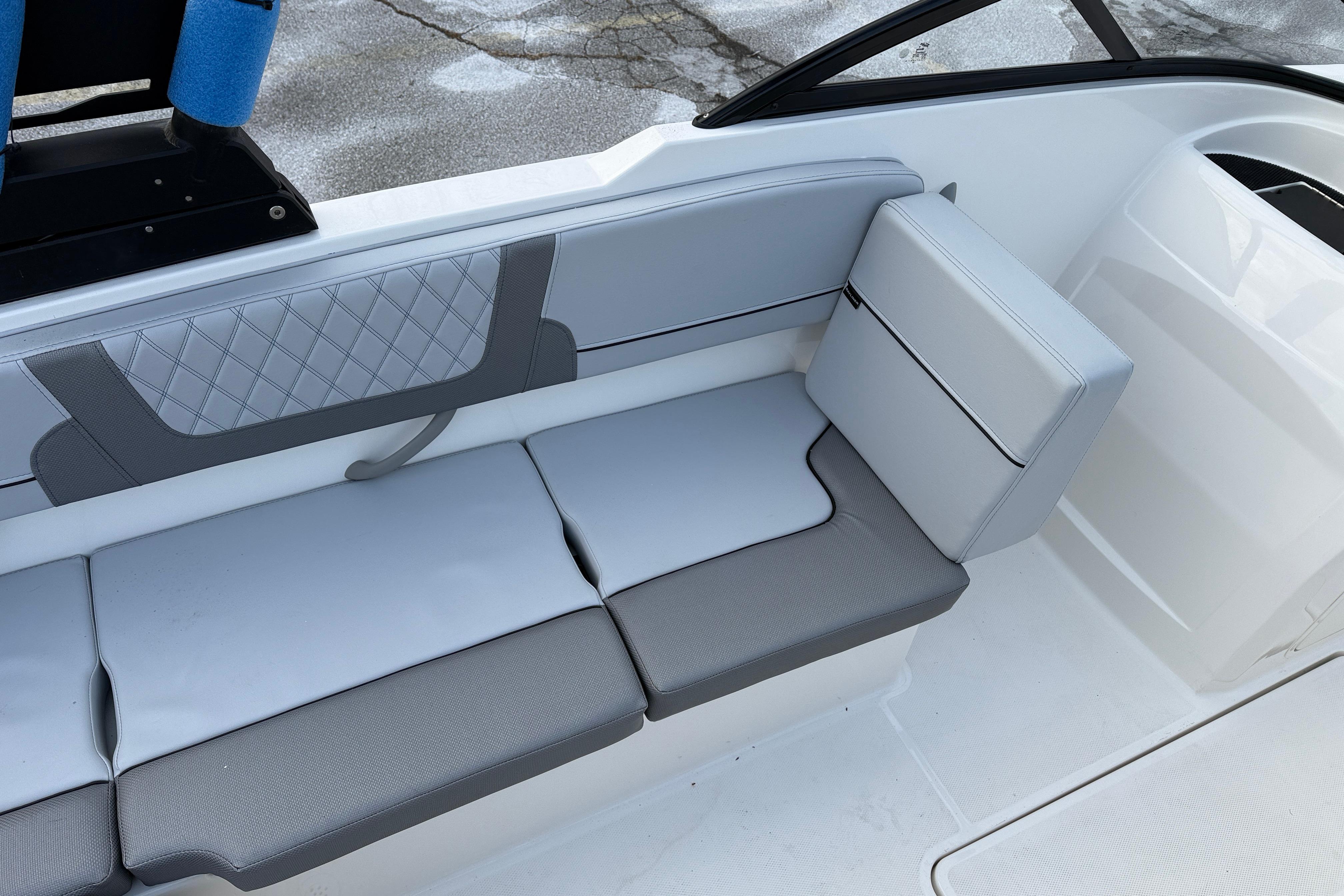 2026 Bayliner VR4 Bowrider OB interior seating with gray upholstery and modern design.