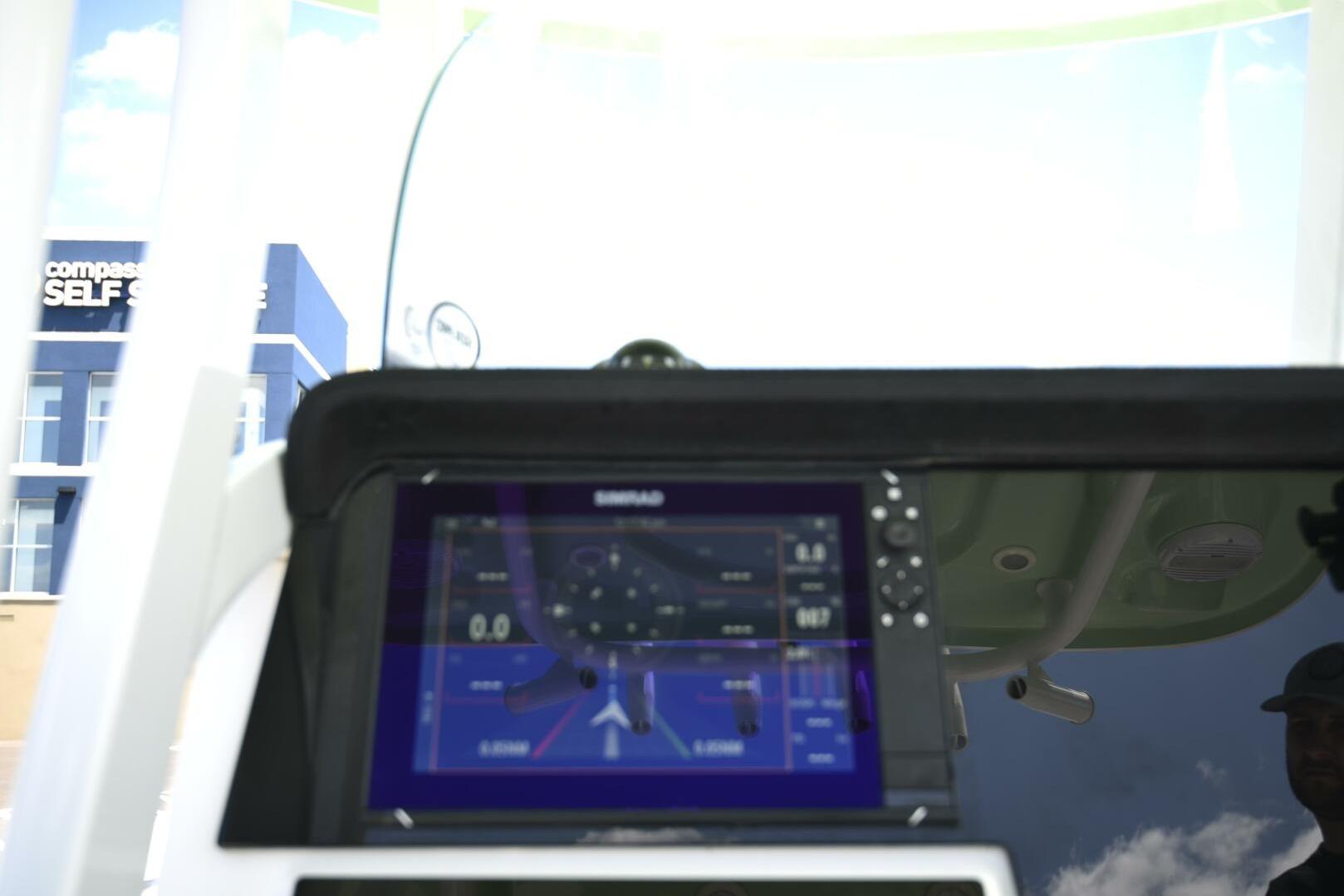 2023 Sea Pro 239 Deep V CC boat dashboard with navigation display.
