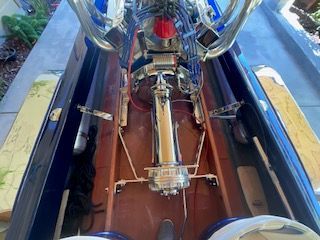 Interior view of a 1980 Sanger HYDRO V DRIVE with visible engine.