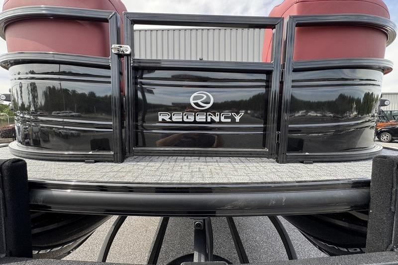 2026 Regency 230 DL pontoon boat with sleek black exterior and red seating.