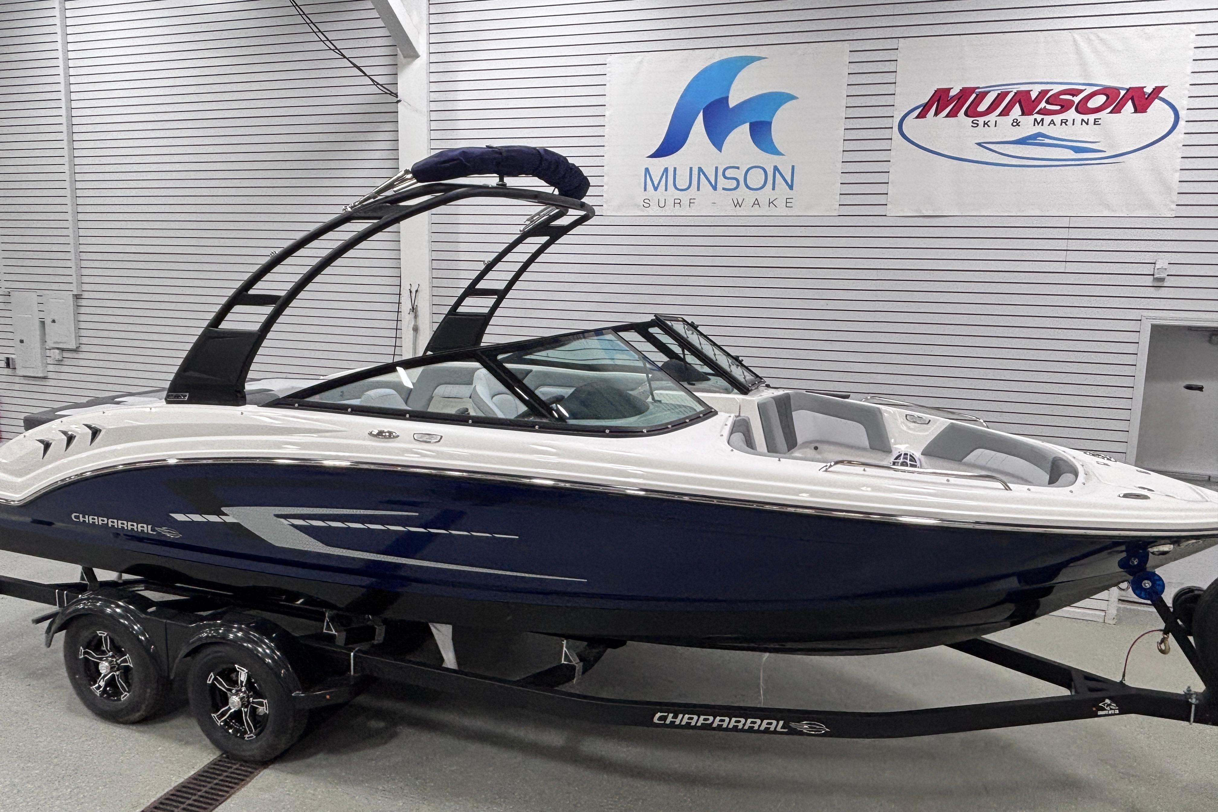 2026 Chaparral 23 SSi boat displayed at Munson Ski & Marine showroom.