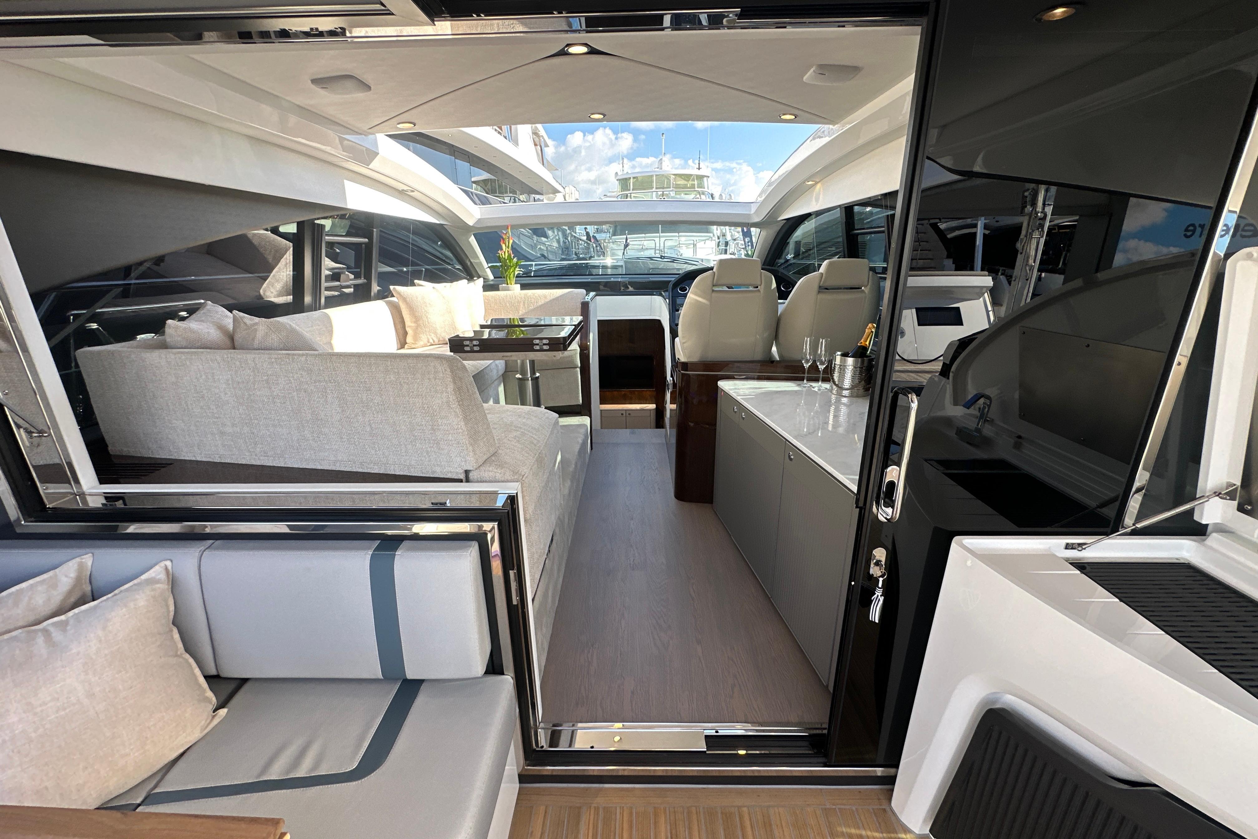 Luxurious interior of 2026 Fairline Targa 47 GT yacht with elegant seating and modern design.