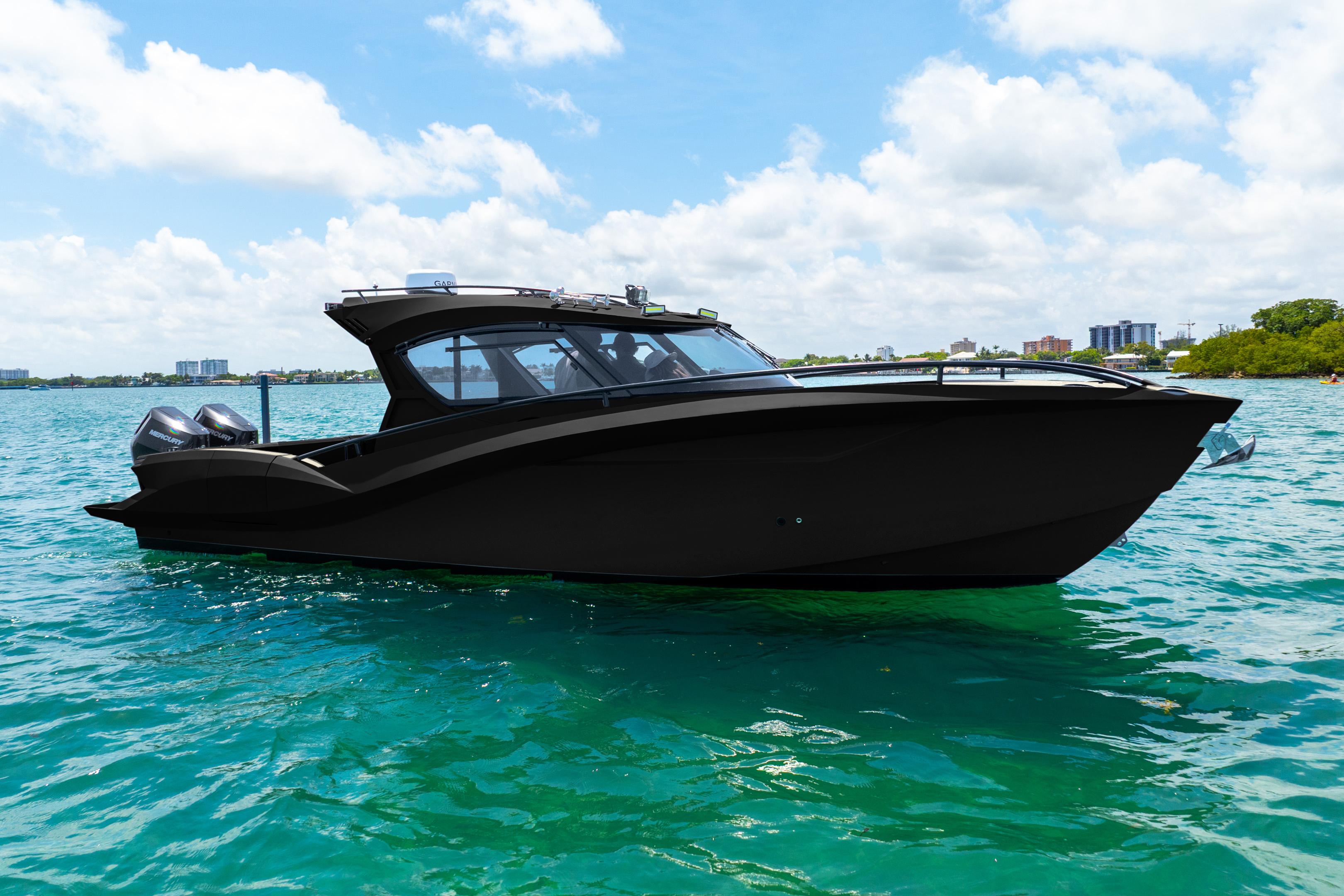 2025 Novielli SERE boat on clear blue water under a sunny sky.