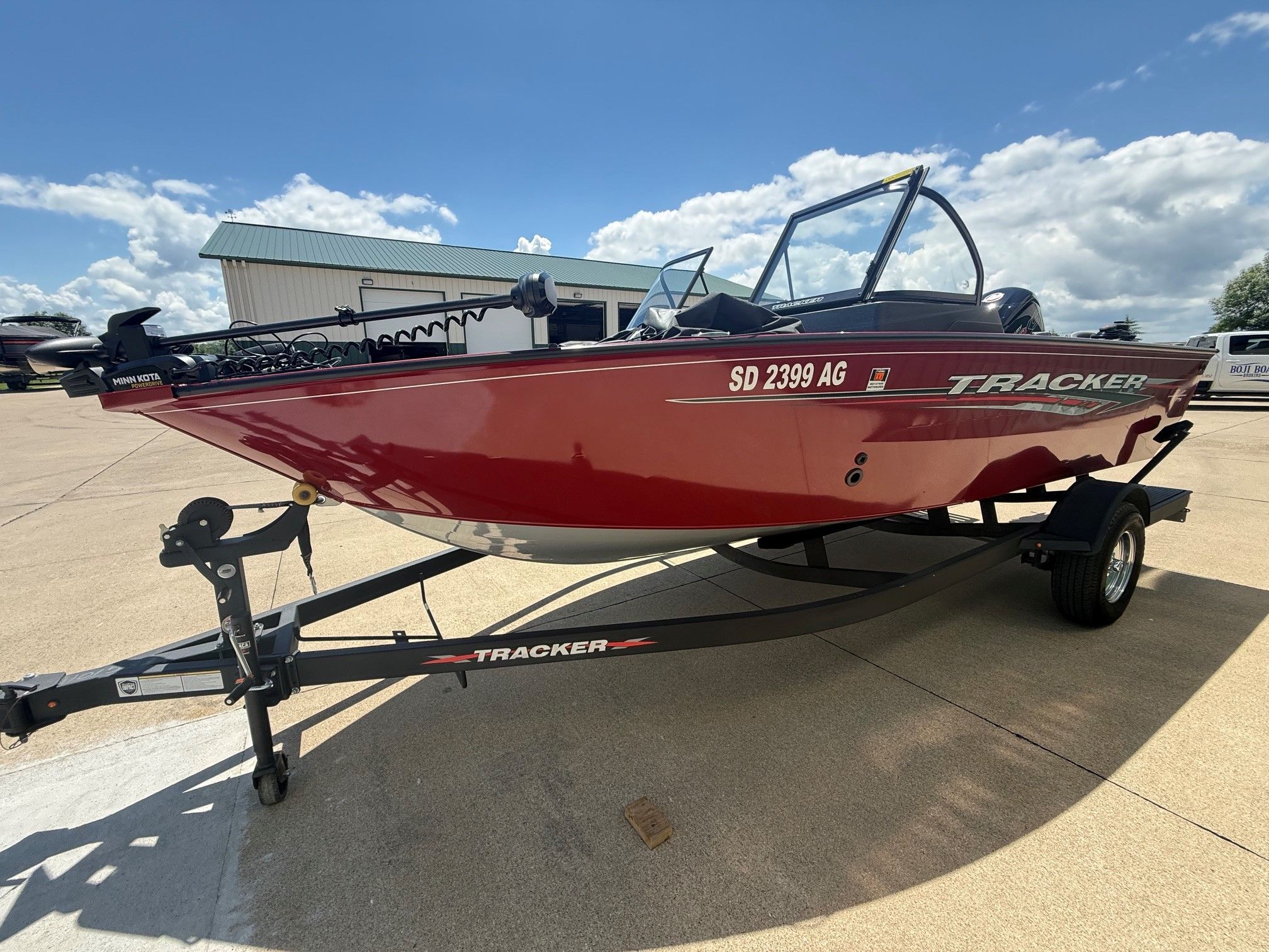 Red 2024 Tracker Pro Guide V175 boat on trailer.