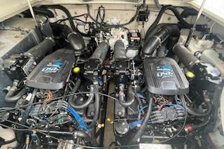 Engine compartment of a 2005 Sea Ray Sundancer 320, showcasing dual inboard motors.