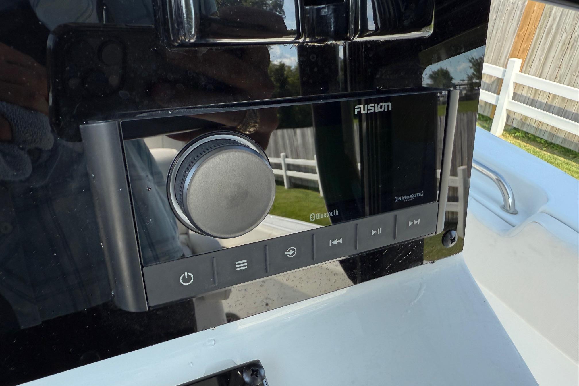 Fusion audio system on 2026 Sea Hunt Ultra 229 boat dashboard.
