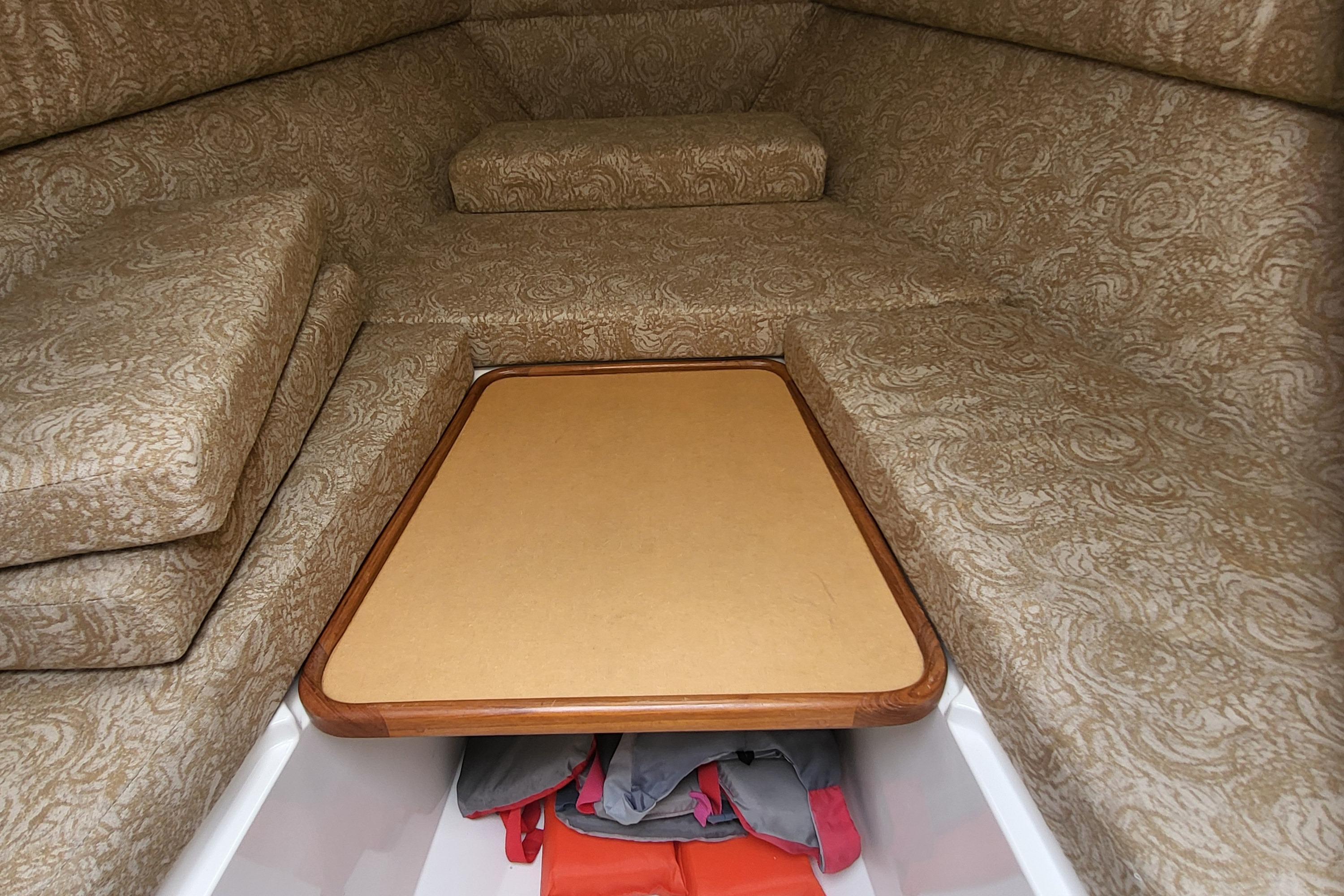 Interior of 2004 Jupiter 31 Center Console boat with upholstery.