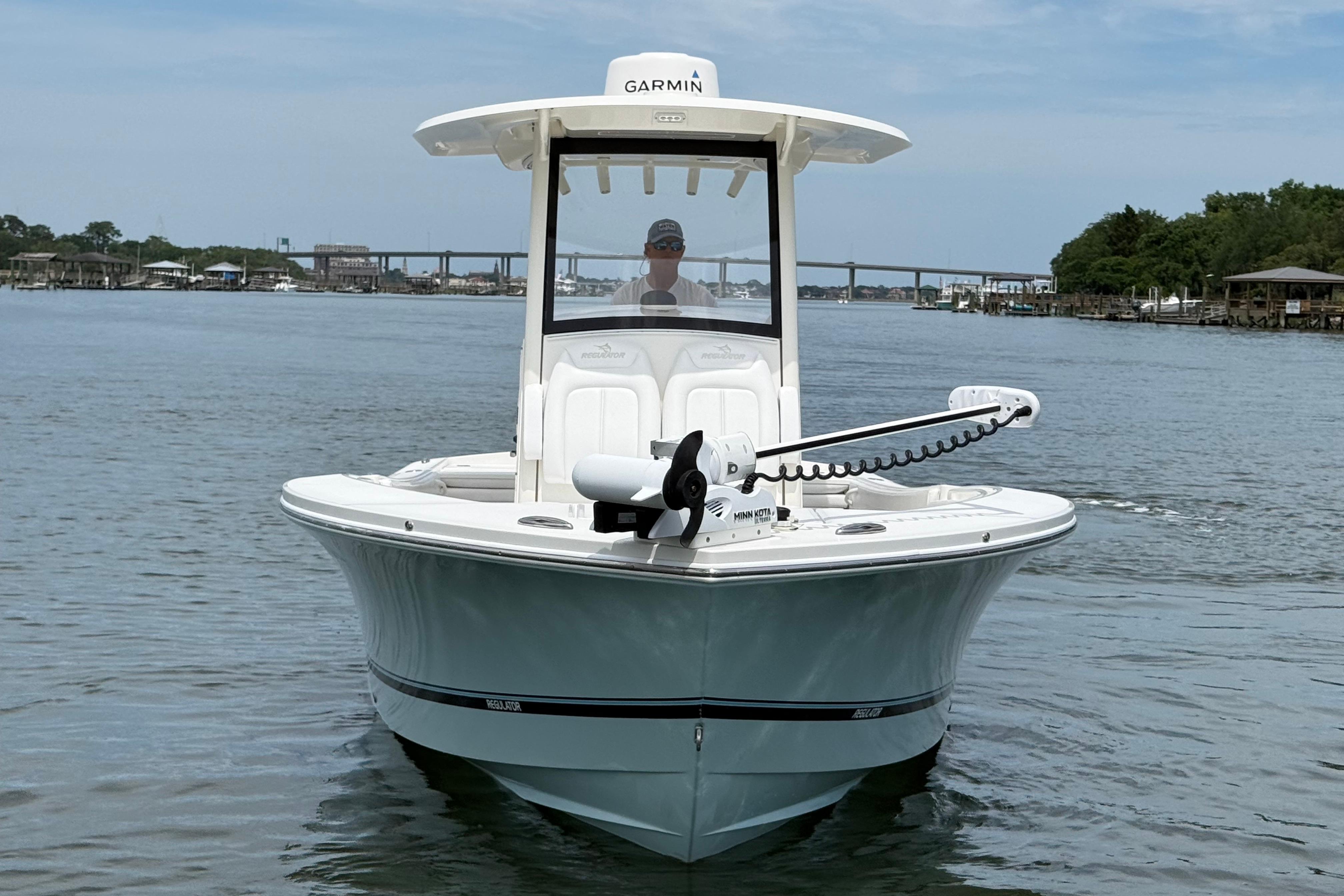 2019 Regulator 26XO boat on water, featuring Garmin equipment and Minn Kota trolling motor.