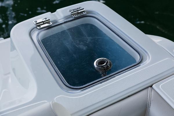 Manufacturer Provided Image: 2024 Boston Whaler 230 Outrage boat compartment with a secure latch.