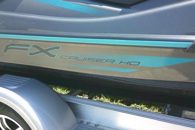 2023 Yamaha FX Cruiser HO jet ski on trailer, showcasing sleek design and branding.