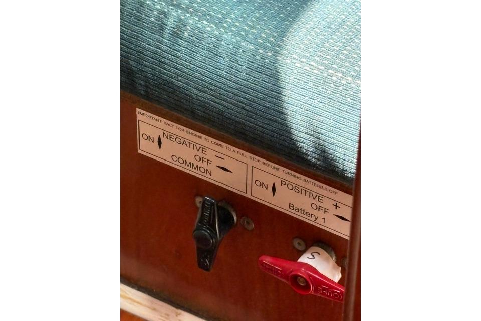Battery switches on a 2000 Beneteau Oceanis 321 sailboat interior panel.