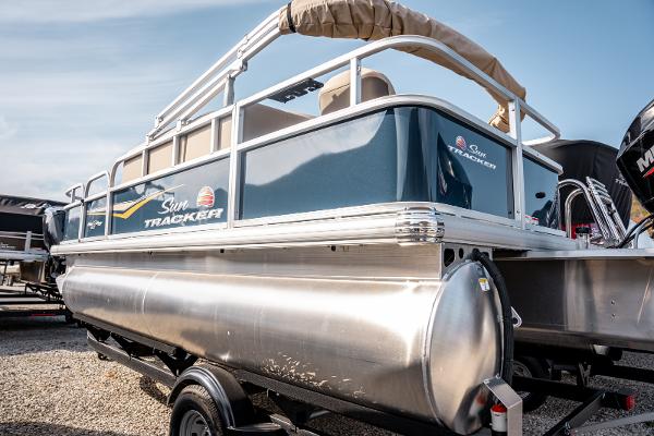 2025 Sun Tracker BASS BUGGY 18 pontoon boat on trailer, side view.