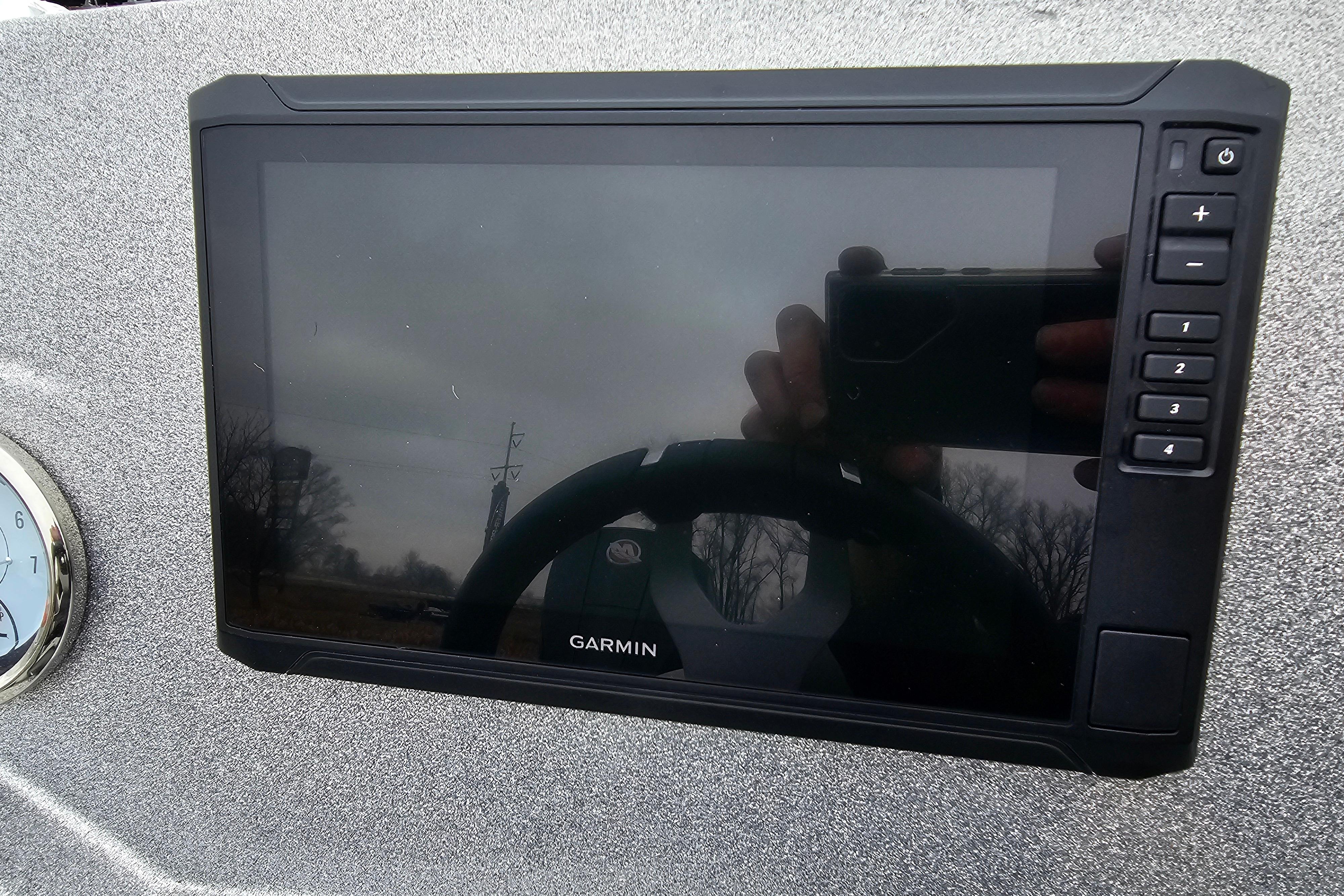 Garmin display on Nitro Z18 Pro 2025 dashboard, featuring control buttons.