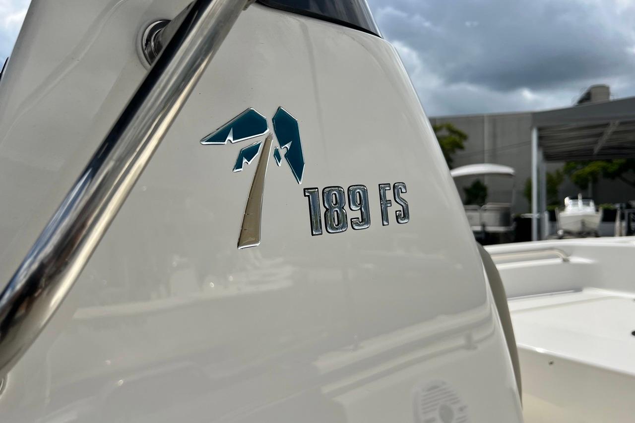 Close-up of 2026 Key West 189 FS boat logo and railing.