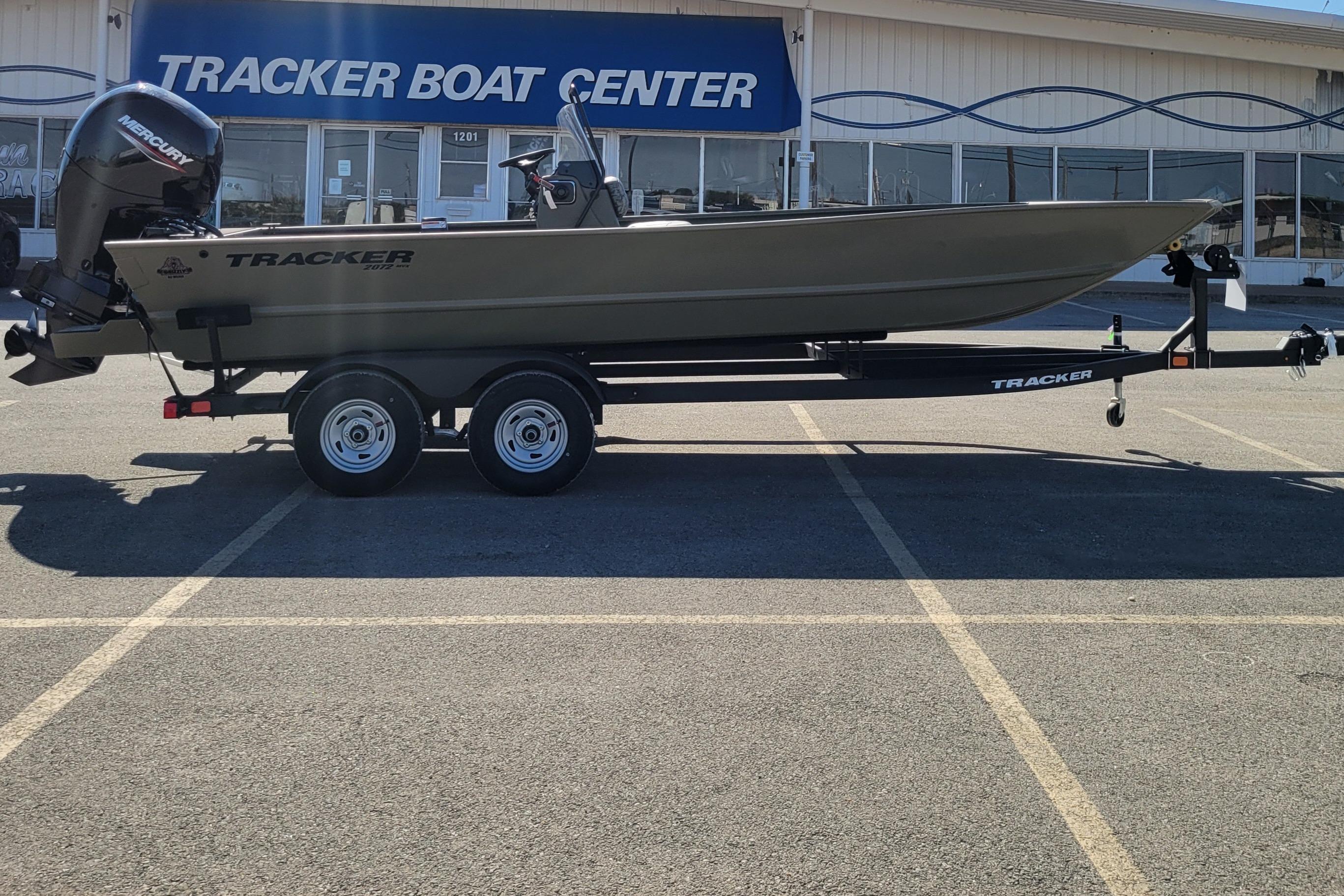2026 Tracker Grizzly 2072 CC boat on trailer at Tracker Boat Center.