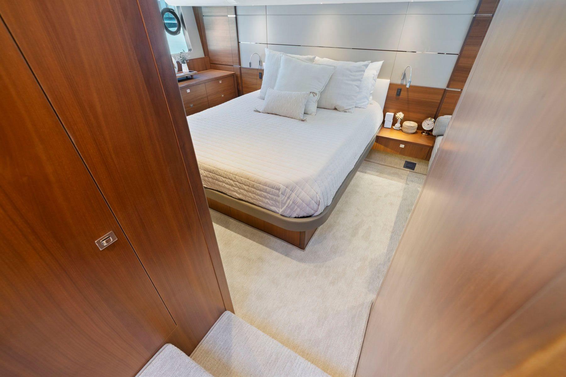 Luxurious bedroom interior of 2015 Princess 60 Flybridge Motor Yacht.