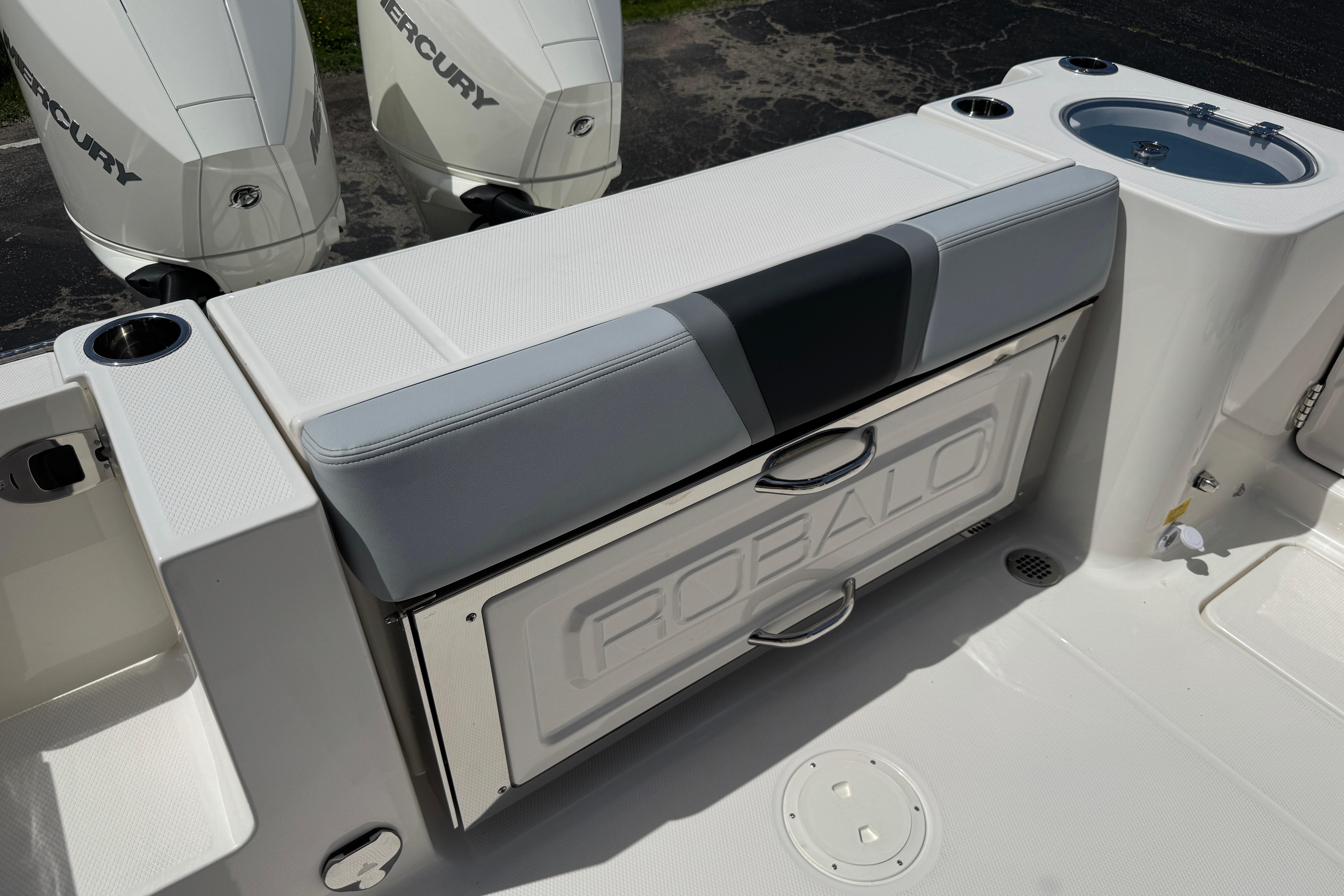 2026 Robalo R250 Center Console boat with dual Mercury engines and seating area.