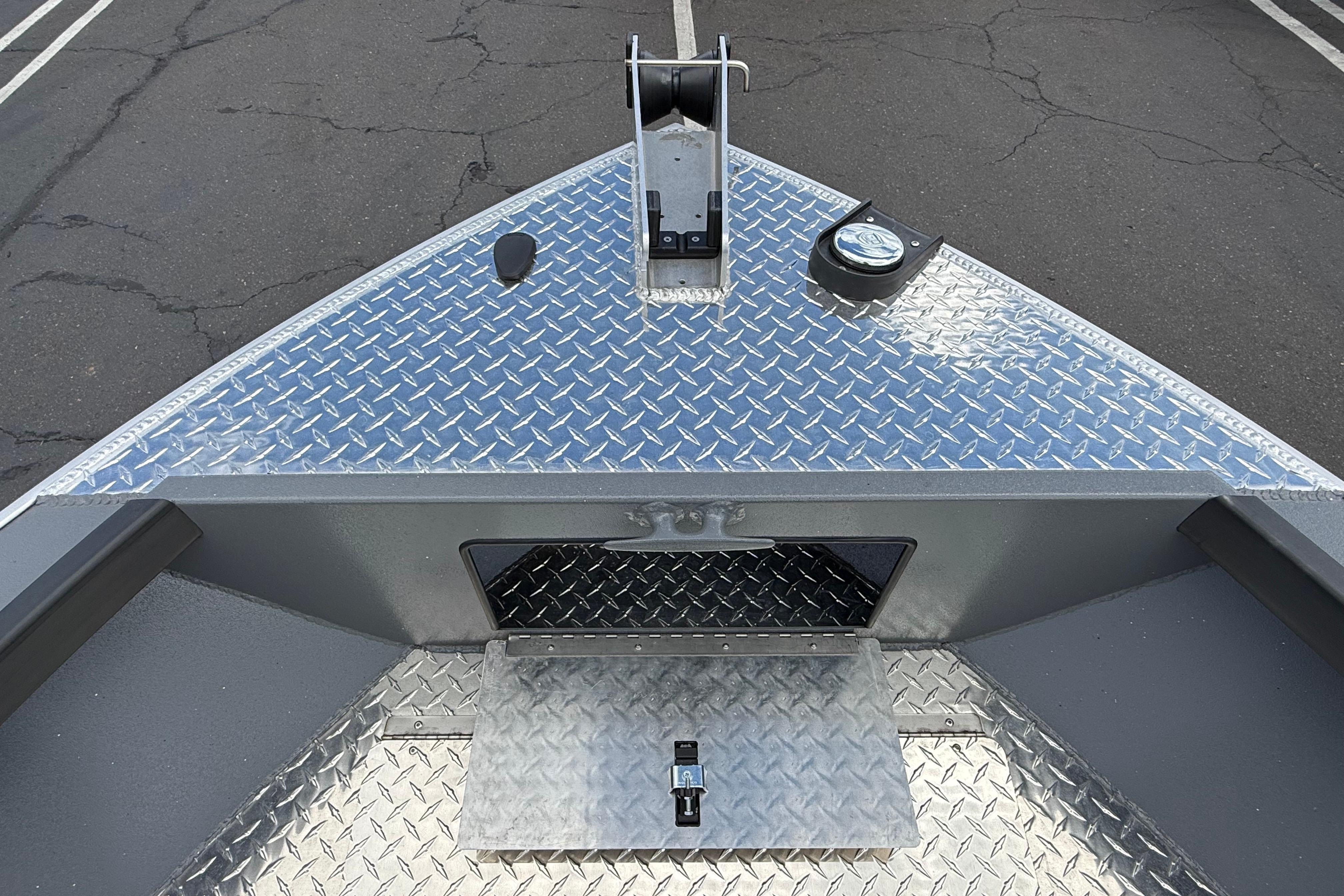 2026 Alumaweld Free Drifter 20 boat bow with diamond plate deck and compass.